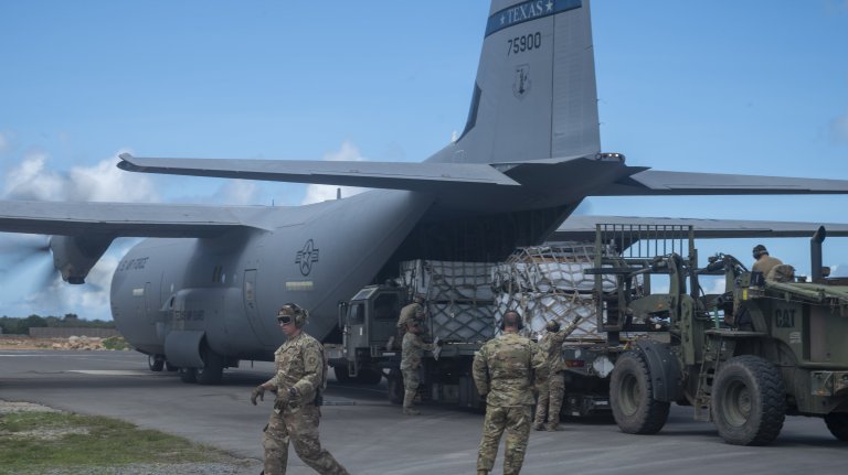 Image: U.S. Air Force loadmasters with the 75th Expeditionary Airlift Squadron load cargo onto a C-130J Super Hercules at Manda Bay, Kenya, May 2, 2025. As U.S. Air Forces Africa’s sole airlift unit, the 75th Expeditionary Airlift Squadron provides C-130 tactical airlift support to multiple users in East Africa, including aeromedical evacuation, logistical movements, alert aircrews, and aircraft for crisis response and humanitarian operations. (U.S. Air National Guard photo by Kevin Ray J. Salvador)