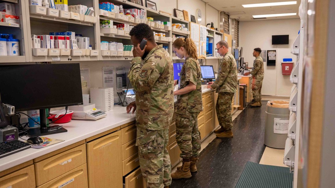 U.S. Air Force Airmen work at the 18 Wing medical building pharmacy on Kadena Air Base, Japan, Aug. 13, 2025. The 18th MDSS team supports deployed personnel and ensures mission readiness by providing essential medications to Airmen and their families. (U.S. Air Force photo by Airman 1st Class Karina Lopez)