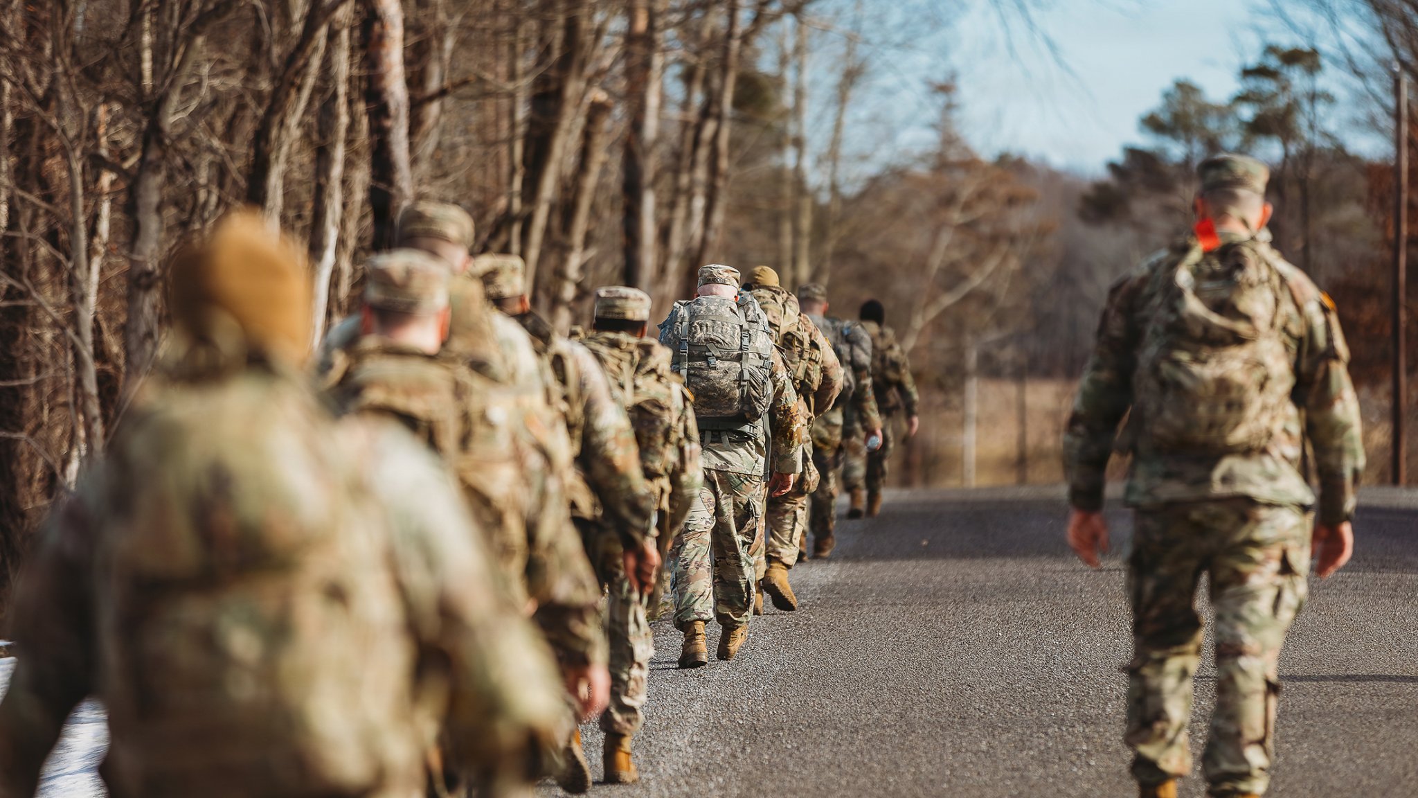 U.S. Soldiers with Bravo Company, 1st Battalion, 112th Infantry Regiment, 56th Stryker Brigade Combat Team ruck march near the Cambridge Springs Readiness Center in Cambridge Springs, Pennsylvania, Jan. 8, 2026. Soldiers complete ruck marches, usually a number of miles with a weighted ruck sack, to build military fitness and readiness. (U.S. Army National Guard photo by Staff Sgt. Jonathan Campbell)