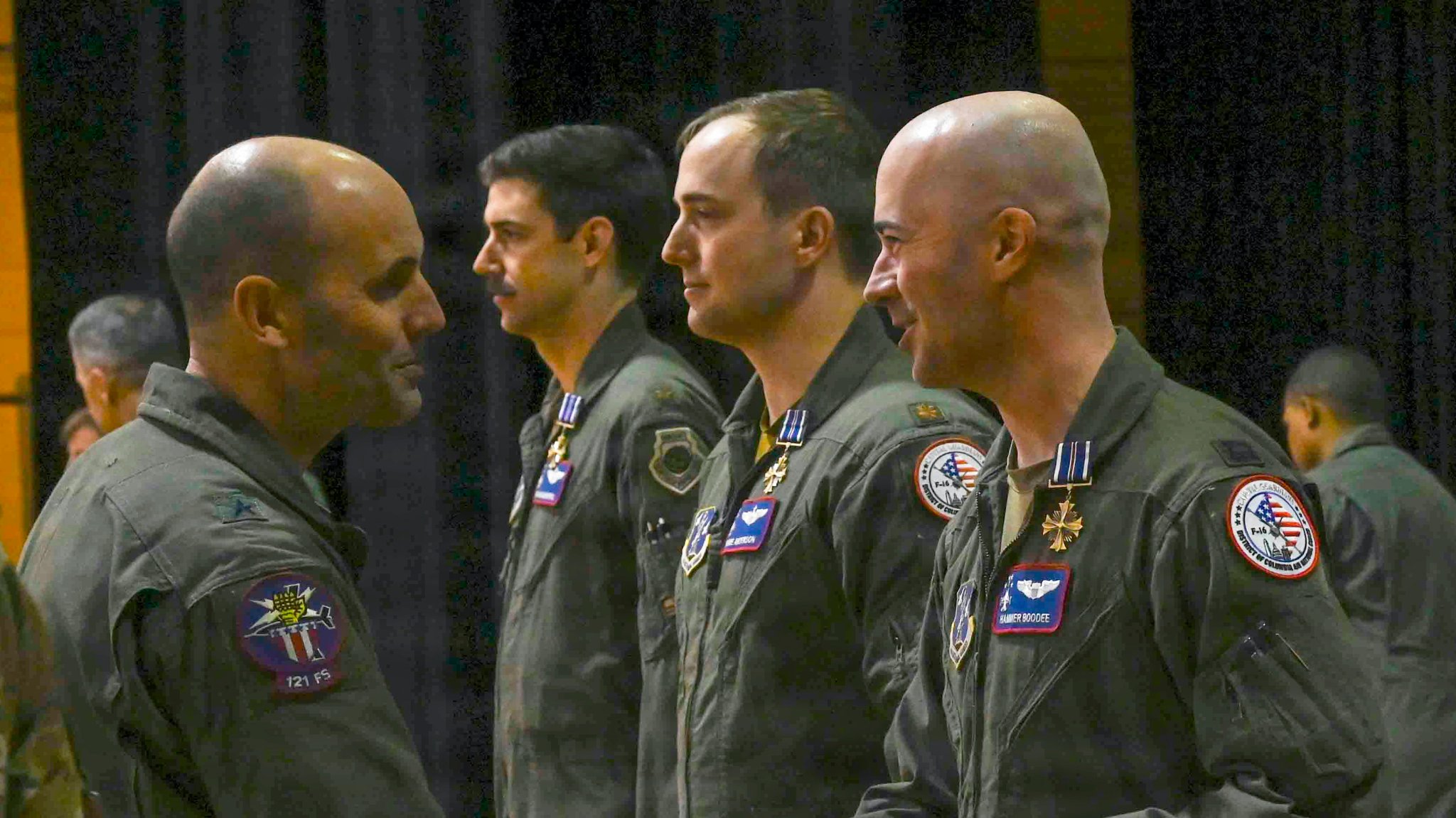 U.S. Air Force Gen. Steven Nordhaus, chief of the National Guard Bureau, awardd three F-16 pilots from the 121st Fighter Squadron, District of Columbia Air National Guard, the prestigious Distinguished Flying Cross with “C” device for combat in a ceremony on Joint Base Andrews, Maryland, Feb, 1, 2026. The awards recognize actions by Majs. Benjamin “Boom” Saunders, Eric “Fume” Anderson and Capt. Ryan “Hammer” Boodee on April 13, 2024 while deployed to Prince Sultan Air Base, Saudi Arabia.
