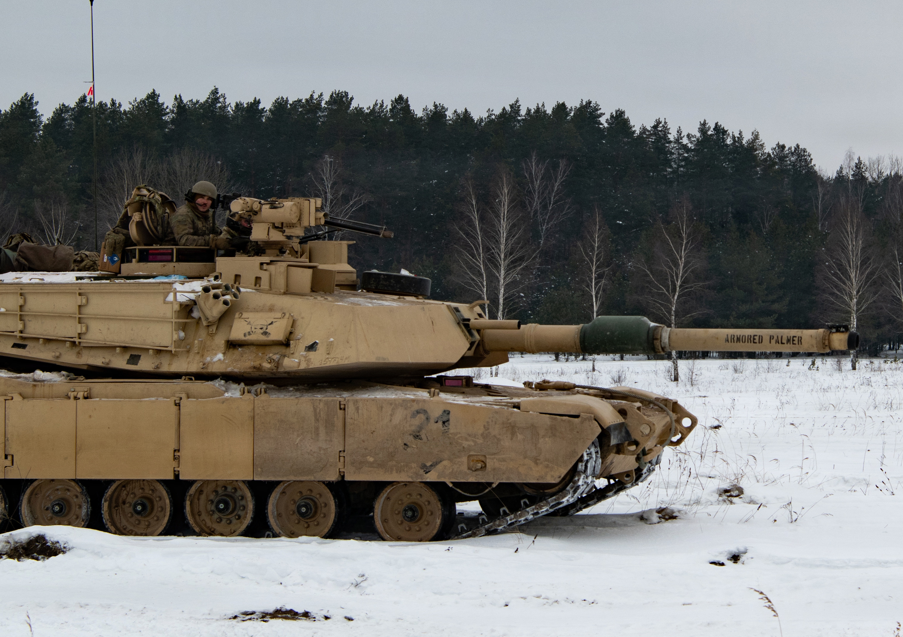 U.S. Army armor crewmen assigned to 3rd Battalion, 8th Cavalry Regiment, maneuver M1A2 Abrams tanks across snow-covered terrain during a platoon-level situational training exercise at Bemowo Piskie Training Area, Poland, Jan. 23, 2026. The training reinforced crew coordination and platoon-level maneuver in a cold-weather environment. “I know if anything happens in the future, we’re ready, 3-8 Cavalry is ready,” said U.S. Army Pfc. Saul Colon, an armor crewman assigned to 3rd Battalion, 8th Cavalry Regiment. (U.S. Army photo by Sgt. Eric Allen)