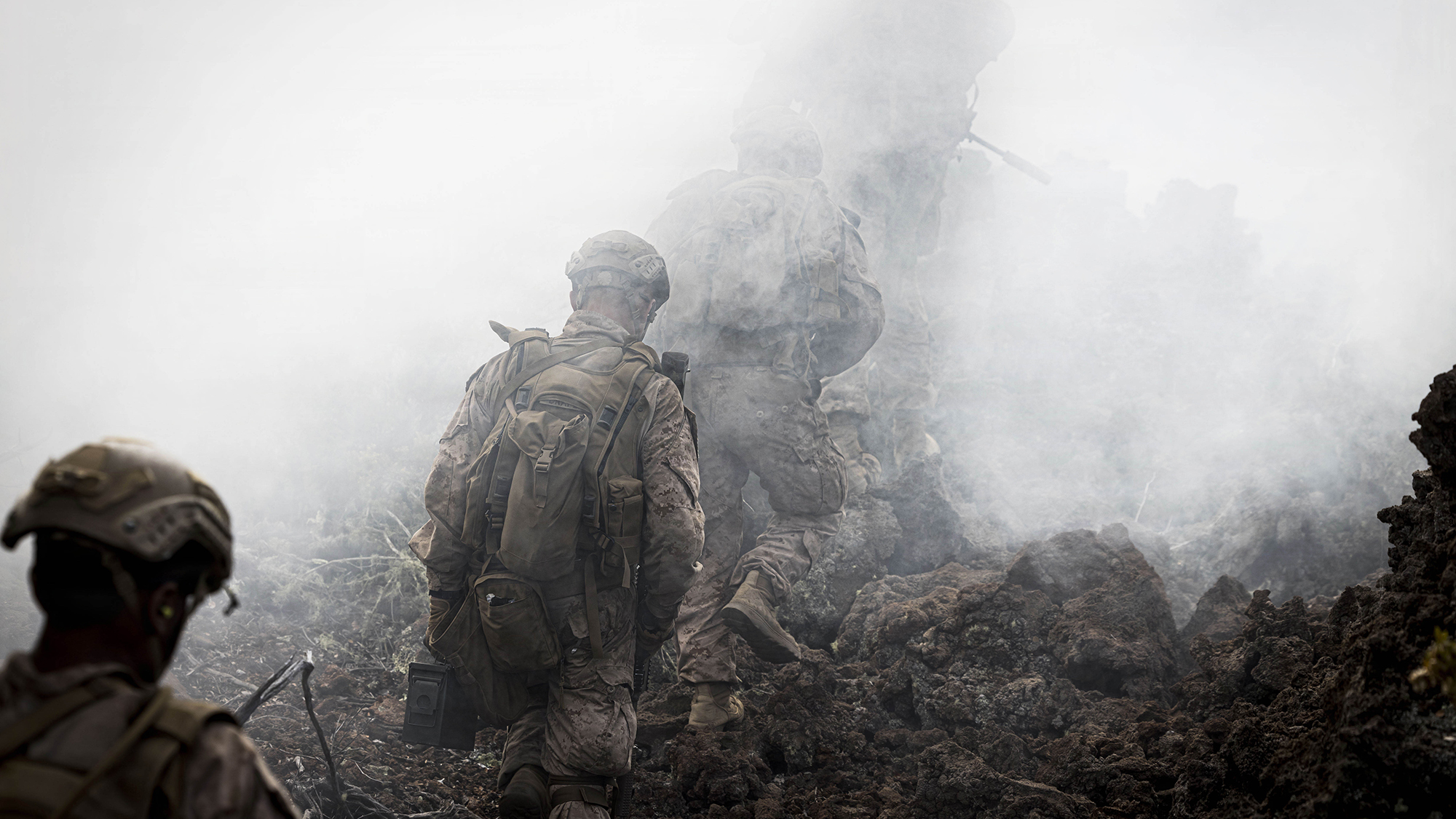 U.S. Marines with 3rd Littoral Combat Team, 3rd Marine Littoral Regiment, 3rd Marine Division, maneuver toward an objective during a live-fire training event at Pohakuloa Training Area, Hawaii, Feb. 3, 2026. The training exercise at PTA refined weapon system and tactical proficiency, strengthening overall combat readiness and preparing 3rd LCT for future operational requirements. (U.S. Marine Corps photo by Sgt. Iyer Ramakrishna)