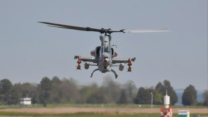 Marine AH-1Z Viper helicopter armed with Red Wolf launched effects.
