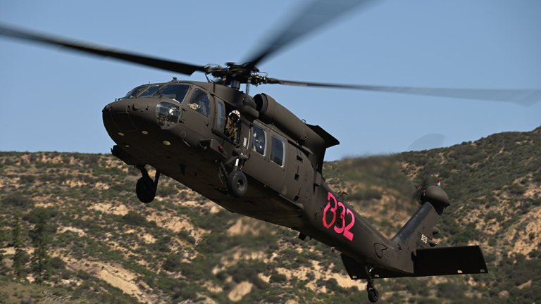 A U.S. Army UH-60M Black Hawk helicopter flown by Soldiers from the 1st Assault Helicopter Battalion, 140th Aviation Regiment, California Army National Guard, lands in a field near Irvine Lake, March 19, 2022, in Silverado, California. Annual interagency training between the California National Guard and the California Department of Forestry and Fire Protection, (U.S. Air National Guard photo by Staff Sgt. Crystal Housman)
