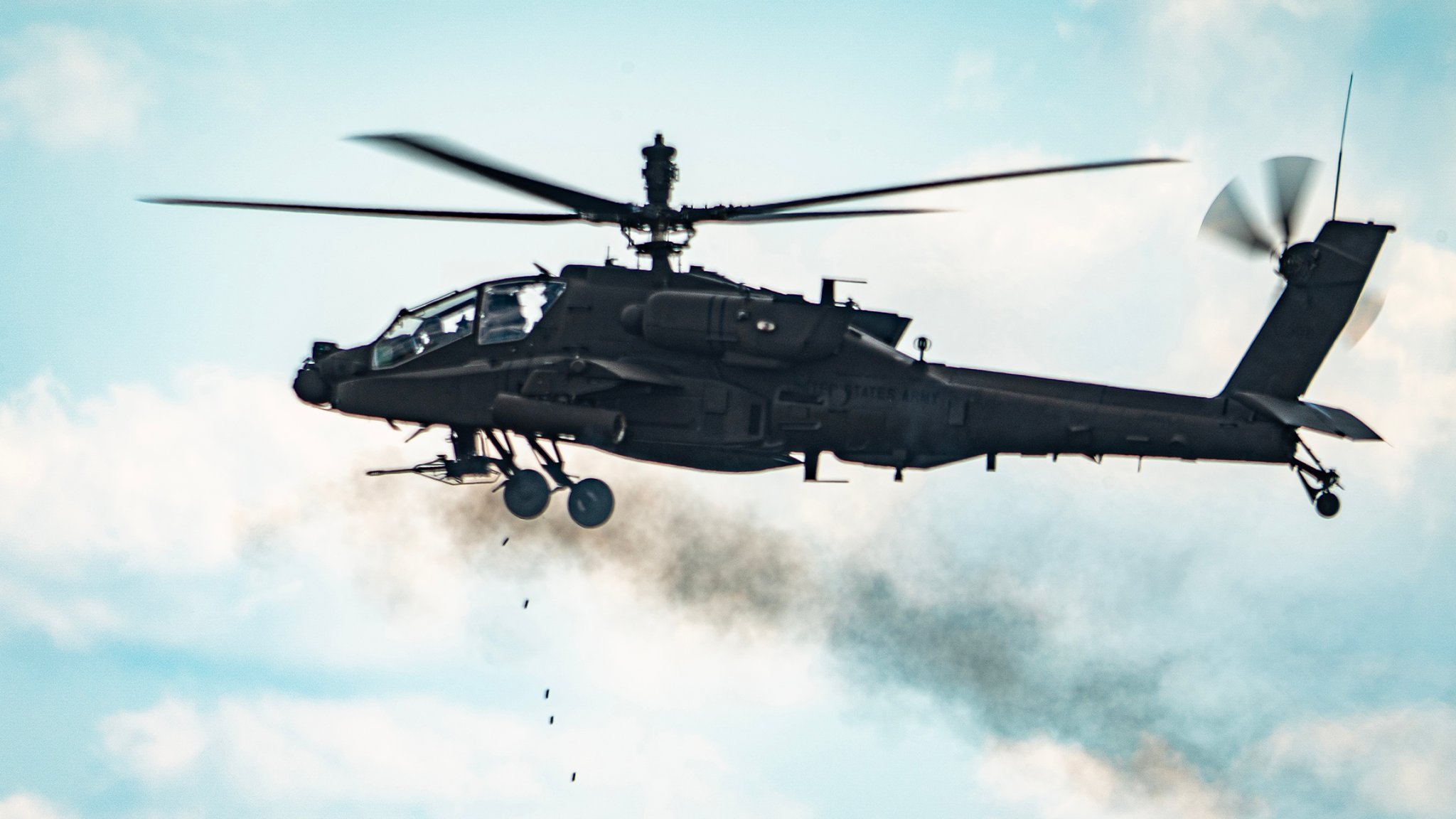 U.S. Soldiers with the 1-151st Attack Reconnaissance Battalion, 59th Aviation Troop Command, South Carolina National Guard, conduct their annual aerial-gunnery qualification table at the Poinsett Range, Sumter, South Carolina, May 22, 2024. Aircrews fired both 30mm rounds and rockets, the training allowed Soldiers to sharpen their armory skills, communication and team work with their assigned AH-64 Apache helicopters. (U.S. Army National Guard photo by Sgt. Tim Andrews)