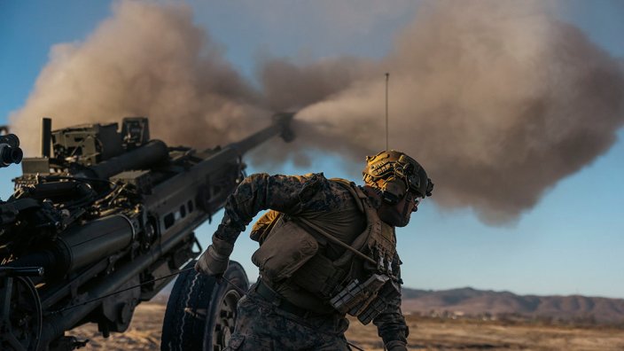 U.S. Marine Lance Cpl. Dashawn M. Rudesill, a cannoneer with 2nd Battalion, 11th Marine Regiment, 1st Marine Division, fires an M777 lightweight 155mm howitzer during a rehearsal for the 250th Amphibious Capabilities Demonstration at Red Beach combat town, Marine Corps Base Camp Pendleton, Oct. 17, 2025. The 250th Amphibious Capabilities Demonstration at Camp Pendleton marks the Marine Corps’ 250th birthday and America’s Semiquincentennial. The live-fire event highlights the Navy-Marine Corps team’s ability to integrate across air, land, and sea, showcasing the Corps’ enduring role as America’s force in-readiness. Rudesill is a native of Rushville, Illinois. (U.S. Marine Corps photo by Gunnery Sgt. Aaron S. Patterson)