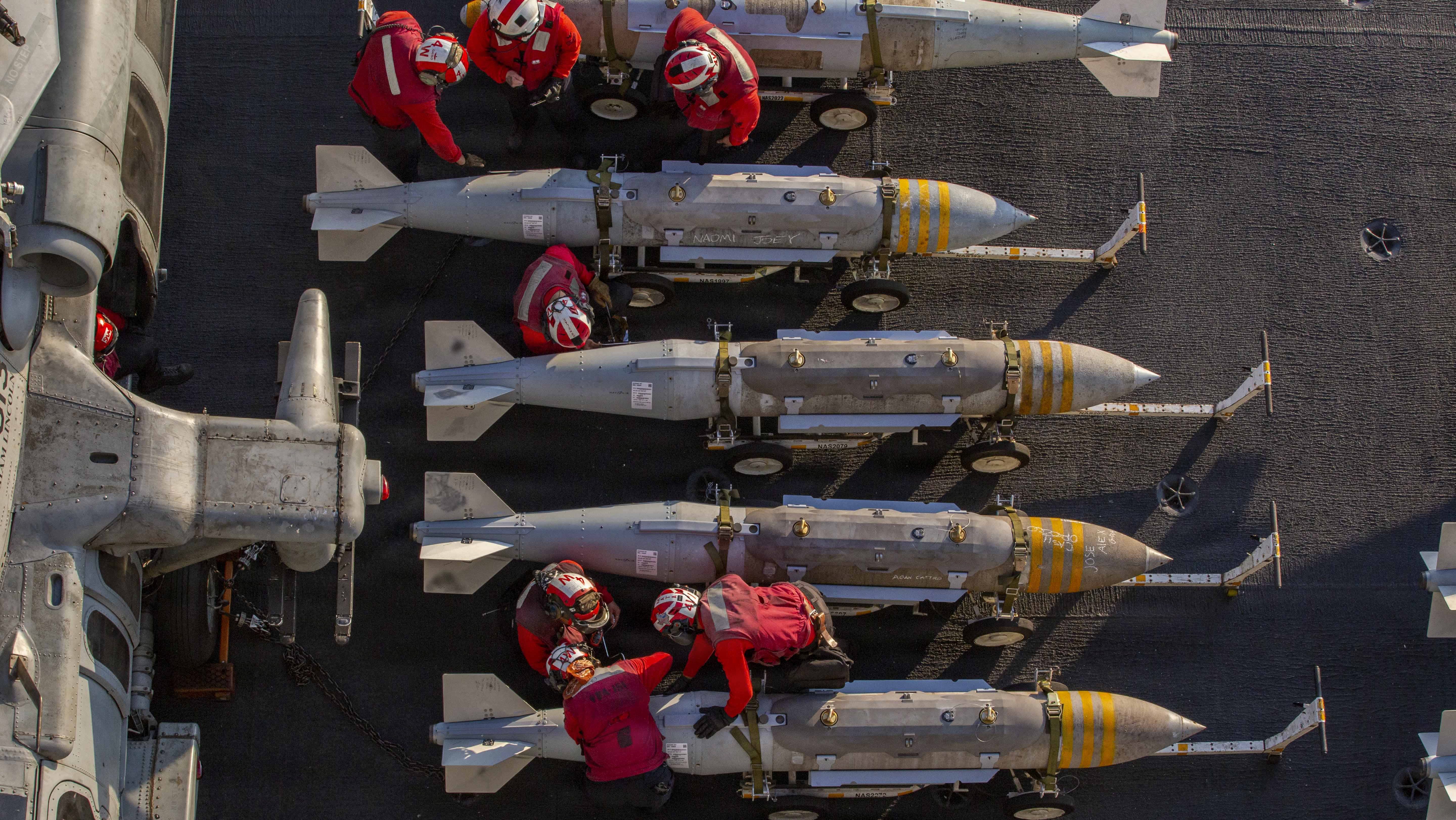 U.S. Sailors prepare to stage ordnance on the flight deck of Nimitz-class aircraft carrier USS Abraham Lincoln (CVN 72) in support of Operation Epic Fury, Feb. 28, 2026. (U.S. Navy photo)