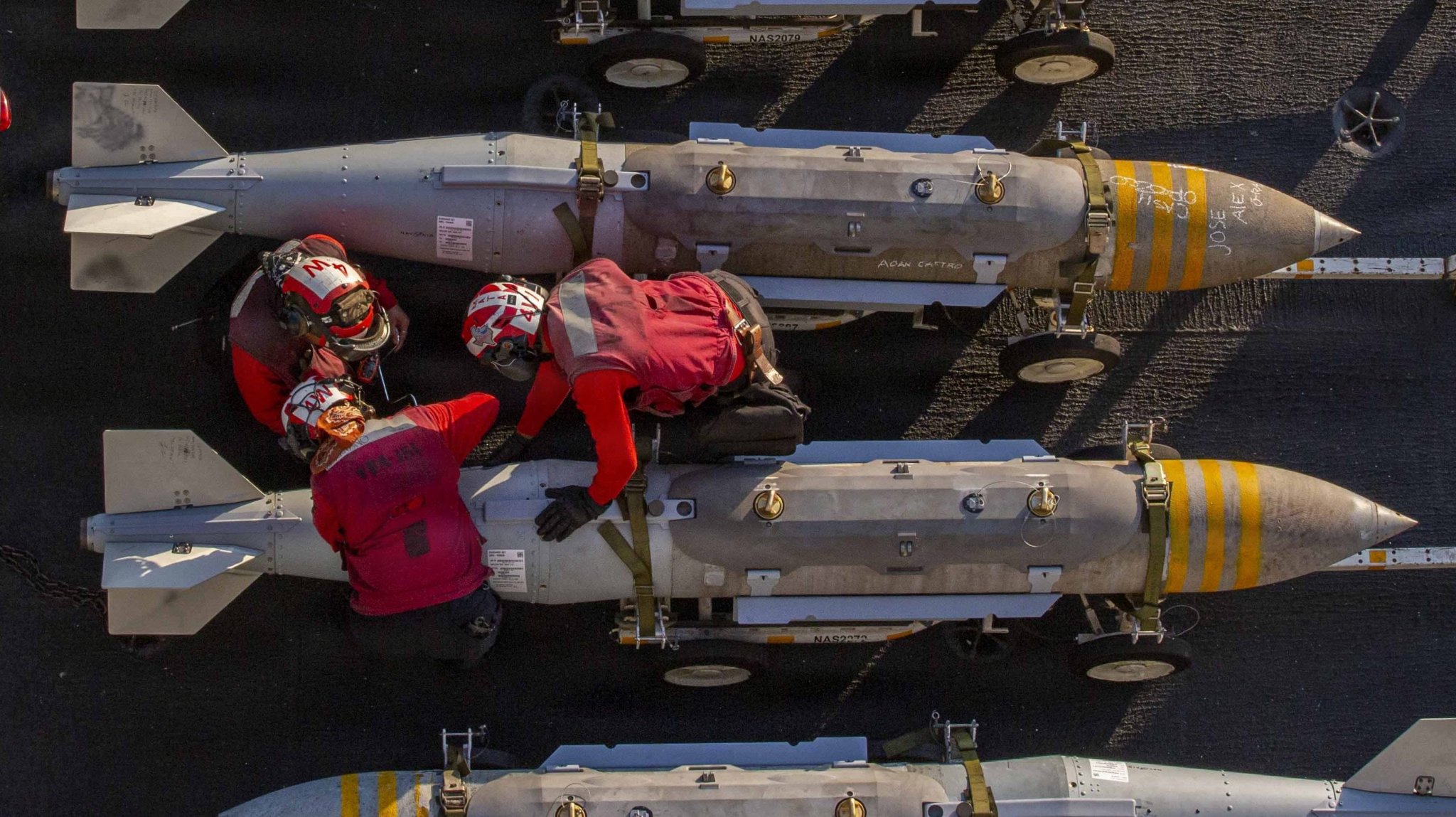 U.S. Sailors prepare to stage ordnance on the flight deck of Nimitz-class aircraft carrier USS Abraham Lincoln (CVN 72) in support of Operation Epic Fury, Feb. 28, 2026. (U.S. Navy photo)