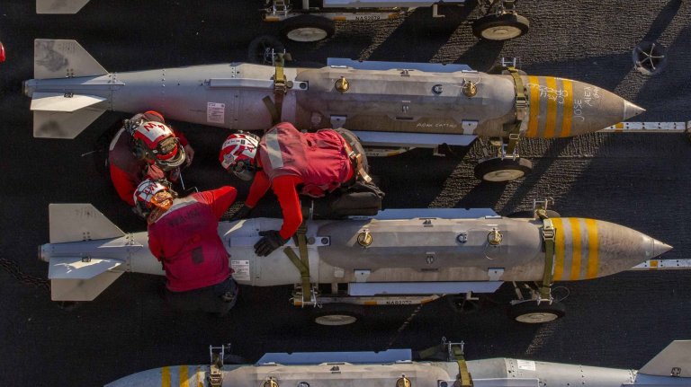 U.S. Sailors prepare to stage ordnance on the flight deck of Nimitz-class aircraft carrier USS Abraham Lincoln (CVN 72) in support of Operation Epic Fury, Feb. 28, 2026. (U.S. Navy photo)