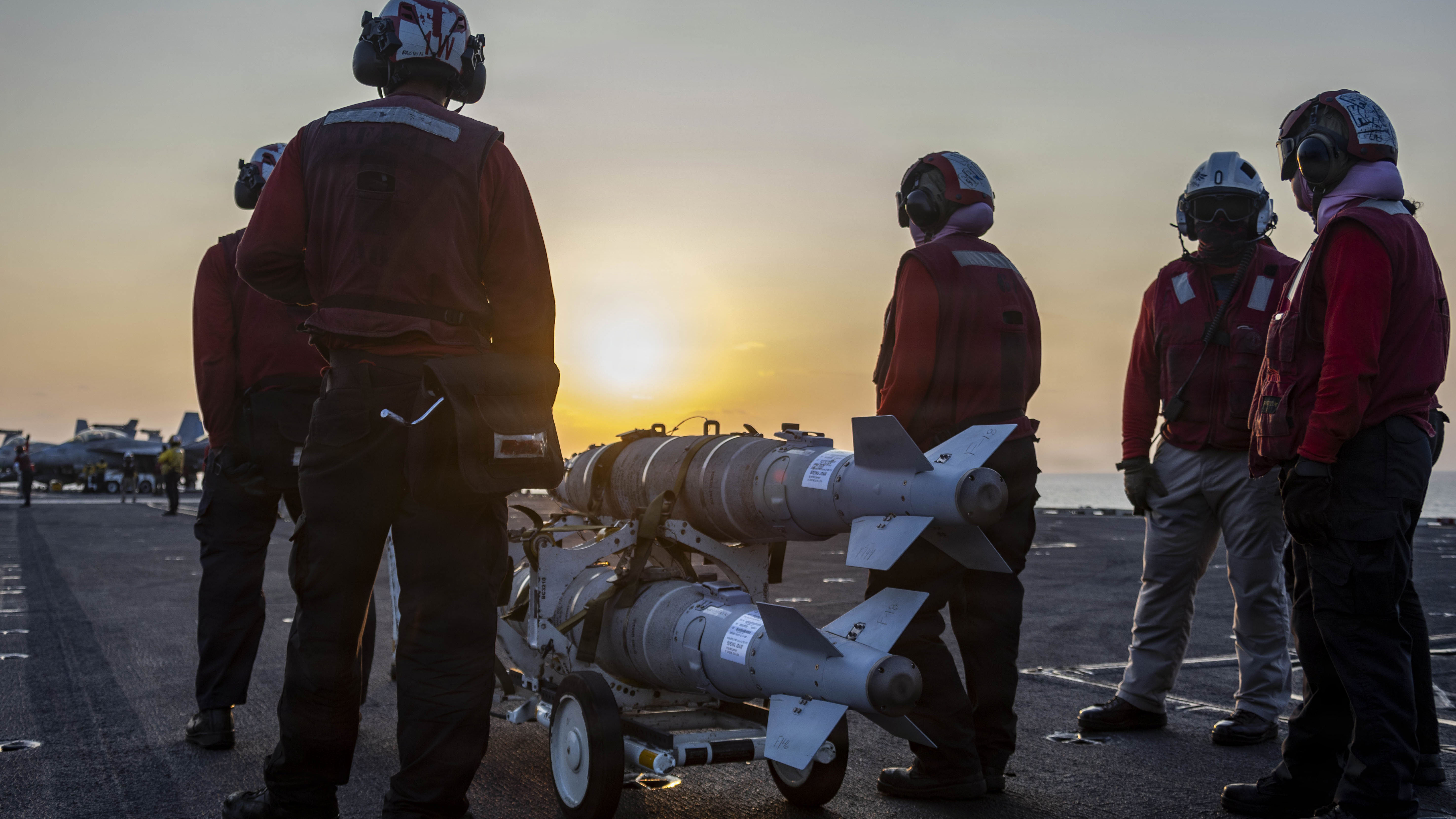 U.S. Sailors prepare ordnance on the flight deck of Nimitz-class aircraft carrier USS Abraham Lincoln (CVN 72) in support of Operation Epic Fury, Mar. 4, 2026. (U.S. Navy photo)