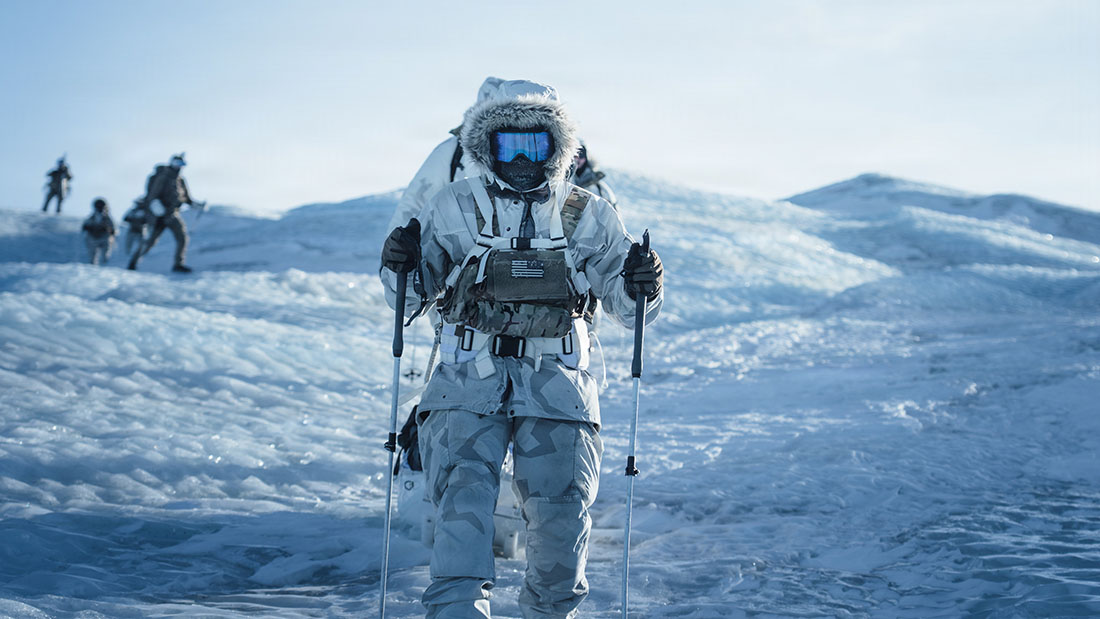 U.S. Air Force Special Operations Forces (SOF) Airmen and Danish Frogmen navigate the ice sheet during a simulated search and rescue for ARCTIC EDGE 2026 (AE26) in Kangerlussaq, Greenland, March 7, 2026. U.S. Air Force SOF Airmen conducted training alongside Danish Frogmen and Greenland Search and Rescue. AE26 is a North American Aerospace Defense Command (NORAD) and U.S. Northern Command-led homeland defense exercise designed to improve readiness, demonstrate capabilities, and enhance Joint and Allied Force interoperability in the Arctic. (U.S. Air Force photo by Christian Sundsdal)