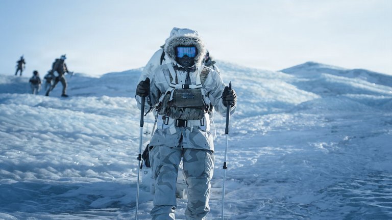U.S. Air Force Special Operations Forces (SOF) Airmen and Danish Frogmen navigate the ice sheet during a simulated search and rescue for ARCTIC EDGE 2026 (AE26) in Kangerlussaq, Greenland, March 7, 2026. U.S. Air Force SOF Airmen conducted training alongside Danish Frogmen and Greenland Search and Rescue. AE26 is a North American Aerospace Defense Command (NORAD) and U.S. Northern Command-led homeland defense exercise designed to improve readiness, demonstrate capabilities, and enhance Joint and Allied Force interoperability in the Arctic. (U.S. Air Force photo by Christian Sundsdal)