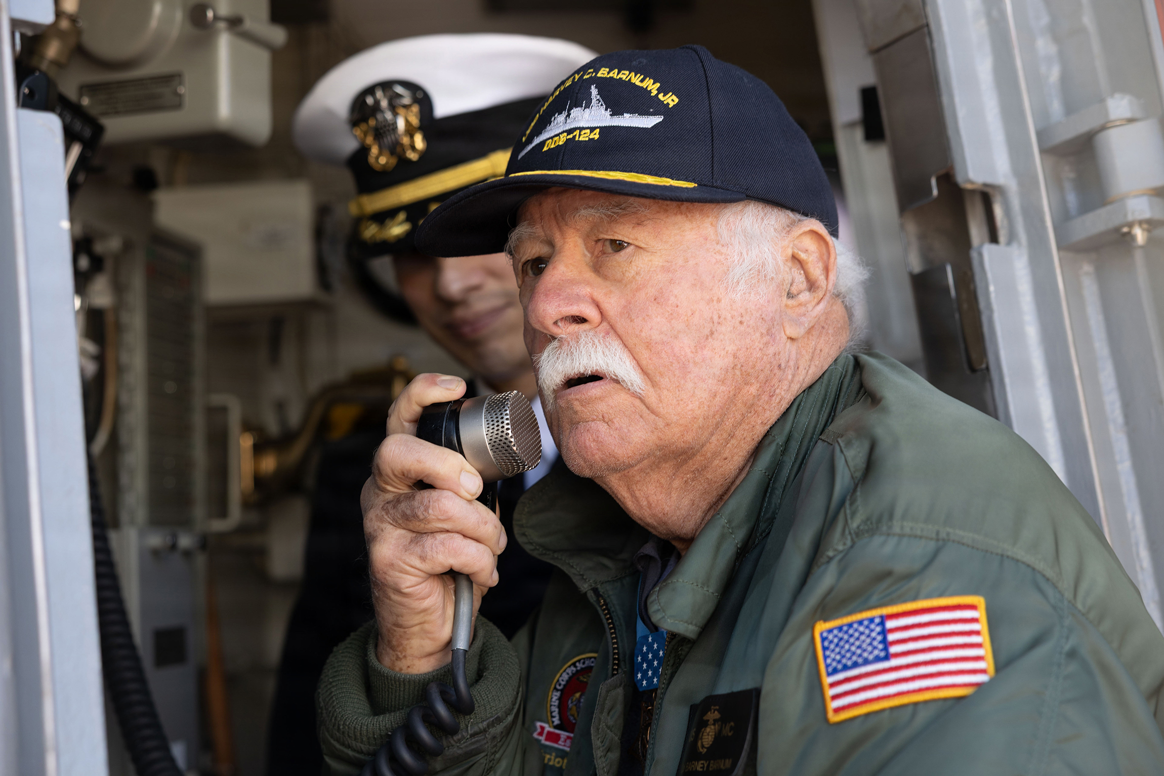 NORFOLK, Va. (March 20, 2026) – Retired U.S. Marine Corps Col. Harvey C. Barnum Jr., a Medal of Honor recipient, addresses the crew of future Arleigh Burke-class guided-missile destroyer USS Harvey C. Barnum (DDG 124). The warship arrived at Naval Station Norfolk ahead of its commissioning scheduled for April 11, 2026 at Naval Station Norfolk. (U.S. Navy photo by Mass Communication Specialist Seaman Apprentice Jackson C. Rott)