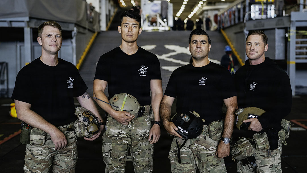 The U.S. Navy dive medical team with Explosive Ordnance Disposal Group ONE (EODGRU-1) pose for a group photo while underway on Amphibious transport dock ship USS John P. Murtha (LPD 26) in the Pacific Ocean, April 9, 2026. John P. Murtha is underway in the U.S. 3rd Fleet area of operations supporting NASA’s Artemis II mission, retrieving the crew and spacecraft following their return to Earth and splashdown in the Pacific Ocean. NASA’s Artemis II mission sent four astronauts on a flight around the moon in the Orion space capsule, marking the first time humans journeyed to deep space in over 50 years. (U.S. Navy photo by Mass Communication Specialist 2nd Class August Clawson)