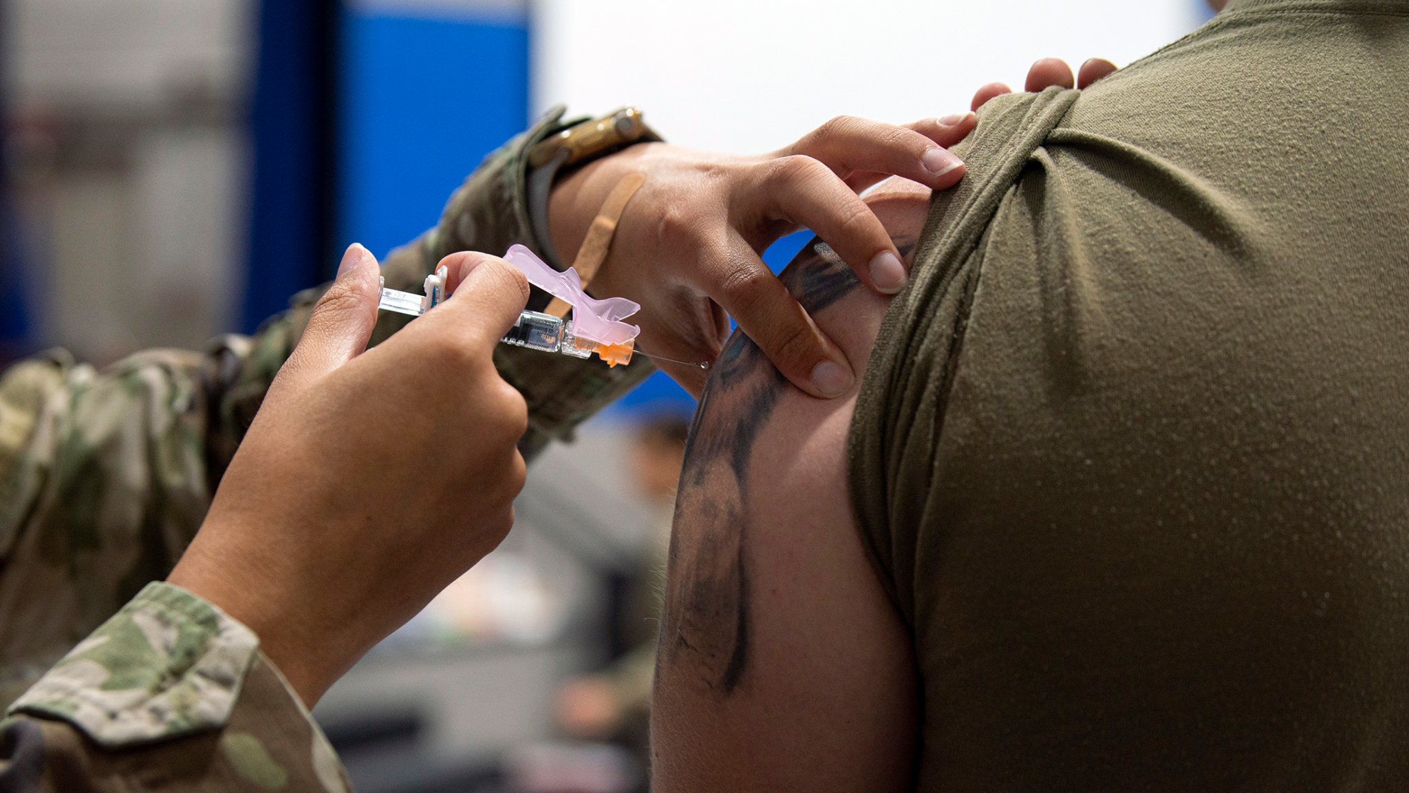 A U.S. Air Force Airman from the 23rd Medical Group administers a dose of the influenza vaccine at Moody Air Force Base, Georgia, Nov.16, 2022. The mass vaccination campaign enabled the 23rd MDG to vaccinate more than 500 personnel per day. (U.S. Air Force photo by Airman 1st Class Whitney Gillespie)