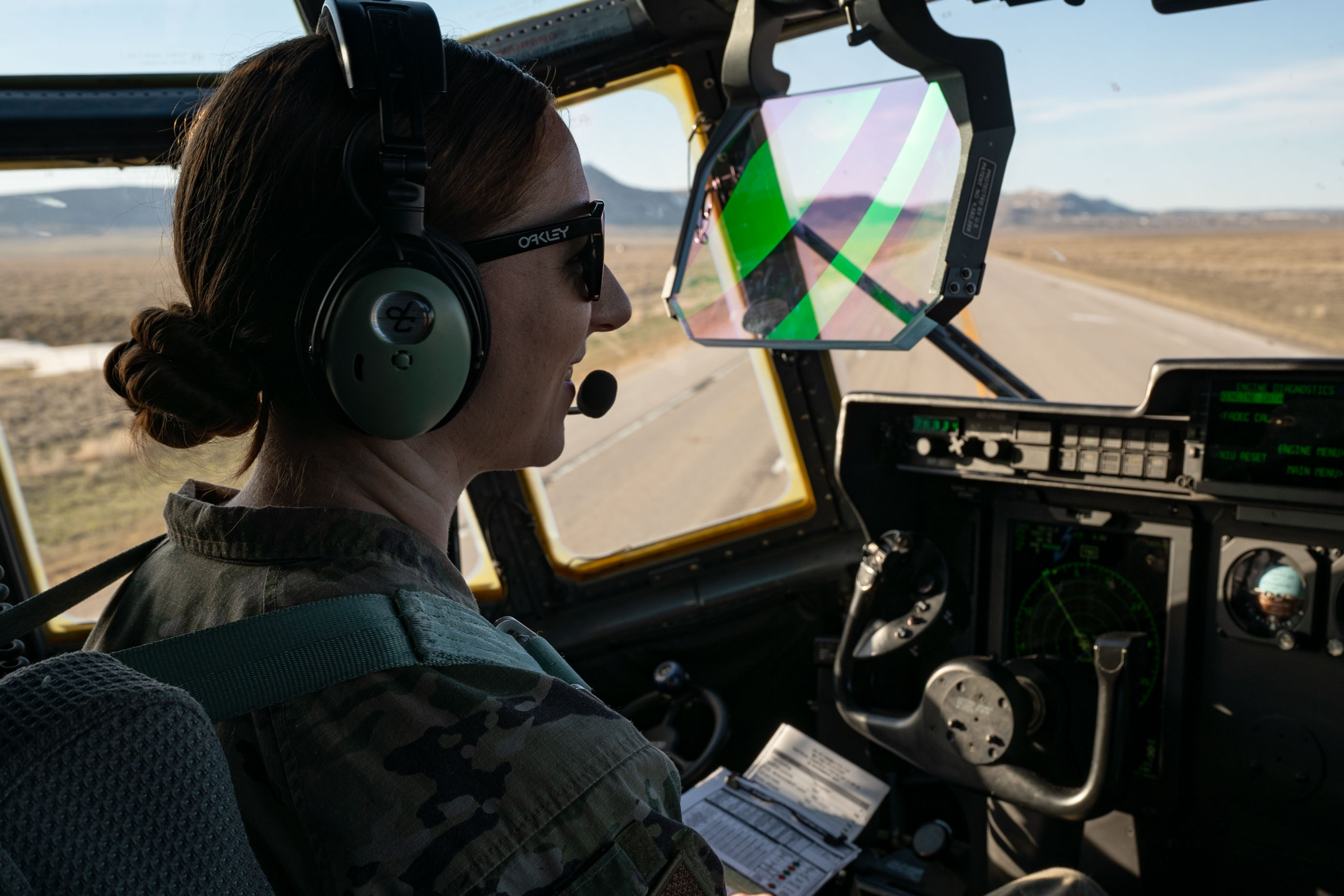 U.S. Air Force Capt. Katheryn Richardson, an aircraft commander assigned to the 15th Special Operations Squadron, smiles after landing an MC-130J Commando II on U.S. Highway 287 during Exercise Agile Chariot, near Rawlins, Wyoming, April 30, 2023. Agile Chariot tested Agile Combat Employment capabilities, including using smaller, more dispersed locations and teams to rapidly move and support aircraft, pilots, and other personnel to wherever they are needed. (U.S. Air Force photo by Senior Airman Natalie Fiorilli)