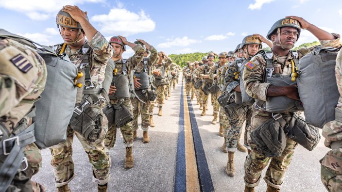 Students with Bravo Company, 1st Battalion, 507th Parachute Infantry Regiment, load a C-130 aircraft during jump week, May 20, 2025, at the Basic Airborne Course on Fort Benning, Georgia. (U.S. Army photo by Capt. Stephanie Snyder)