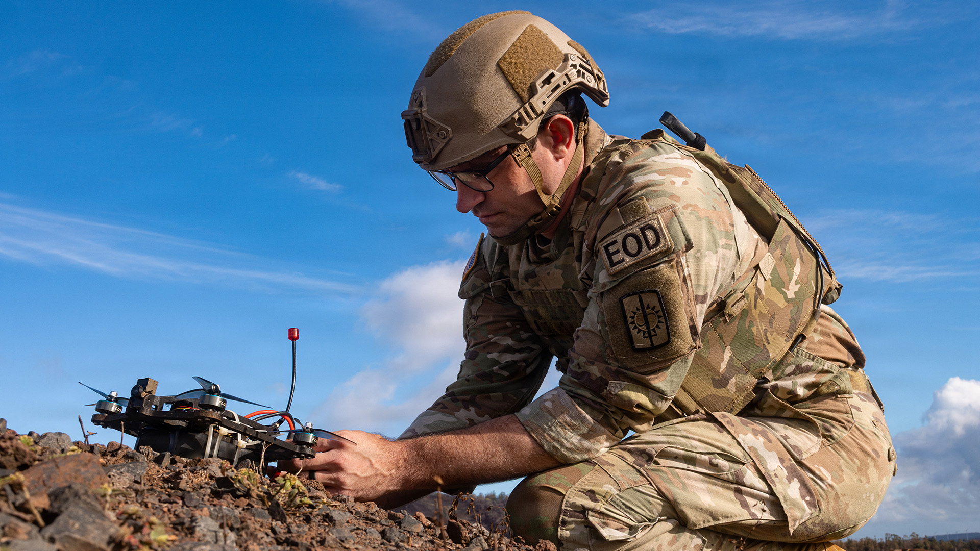 U.S. Army Sgt. 1st Class Taylor Britain, an explosive ordnance disposal (EOD) team leader with the 74th EOD Company, conducts pre-flight checks for the 25th Infantry Division Kestrel First-Person View (FPV) drone during a First-Person View (FPV) drone live-fire exercise at Schofield Barracks, Hawaii, Oct. 17, 2025. Britain developed the firing system, including a mechanical and electronic safety feature on the Kestrel FPV drone. The United States Army Pacific (USARPAC) will conduct Joint Pacific Multinational Readiness Center (JPMRC) Rotation 26-01 from Oct. 28 to Nov. 16, 2025, in and around the Hawaiian island chain. This exercise is designed to validate the combat readiness of the 3rd Mobile Brigade (3MBDE), 25th Infantry Division Artillery (DIVARTY), and the 125th Division Signal Battalion in a joint, multinational, multi-domain training environment. JPMRC 26-01 will integrate U.S. forces, multinational partners, and joint capabilities to train tactics, techniques, and procedures required to dominate jungle and archipelagic terrain during large-scale combat operations. The exercise underscores the U.S. Army’s commitment to ensuring regional security and strengthening partnerships in the Indo-Pacific area of responsibility. (U.S. Army photo by Sgt. Duke Edwards)