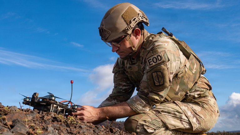 U.S. Army Sgt. 1st Class Taylor Britain, an explosive ordnance disposal (EOD) team leader with the 74th EOD Company, conducts pre-flight checks for the 25th Infantry Division Kestrel First-Person View (FPV) drone during a First-Person View (FPV) drone live-fire exercise at Schofield Barracks, Hawaii, Oct. 17, 2025. Britain developed the firing system, including a mechanical and electronic safety feature on the Kestrel FPV drone. The United States Army Pacific (USARPAC) will conduct Joint Pacific Multinational Readiness Center (JPMRC) Rotation 26-01 from Oct. 28 to Nov. 16, 2025, in and around the Hawaiian island chain. This exercise is designed to validate the combat readiness of the 3rd Mobile Brigade (3MBDE), 25th Infantry Division Artillery (DIVARTY), and the 125th Division Signal Battalion in a joint, multinational, multi-domain training environment. JPMRC 26-01 will integrate U.S. forces, multinational partners, and joint capabilities to train tactics, techniques, and procedures required to dominate jungle and archipelagic terrain during large-scale combat operations. The exercise underscores the U.S. Army’s commitment to ensuring regional security and strengthening partnerships in the Indo-Pacific area of responsibility. (U.S. Army photo by Sgt. Duke Edwards)