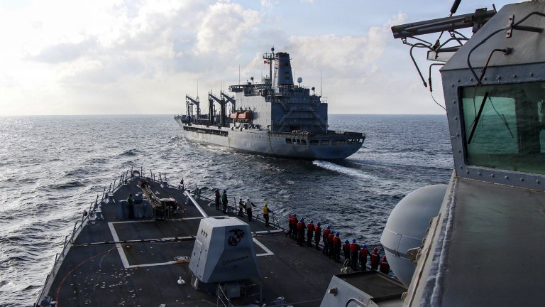 Arleigh Burke-class guided-missile destroyer USS Frank E. Petersen Jr. (DDG 121) sails alongside fleet replenishment oiler USNS Henry J. Kaiser (T-AO-187), during a replenishment-at-sea in the Arabian Sea, Feb. 18, 2026. Frank E. Peterson Jr. is deployed to the U.S. 5th Fleet area of operations to support maritime security and stability in the Middle East. (U.S. Navy photo by Mass Communication Specialist 2nd Class Christian Kibler)
