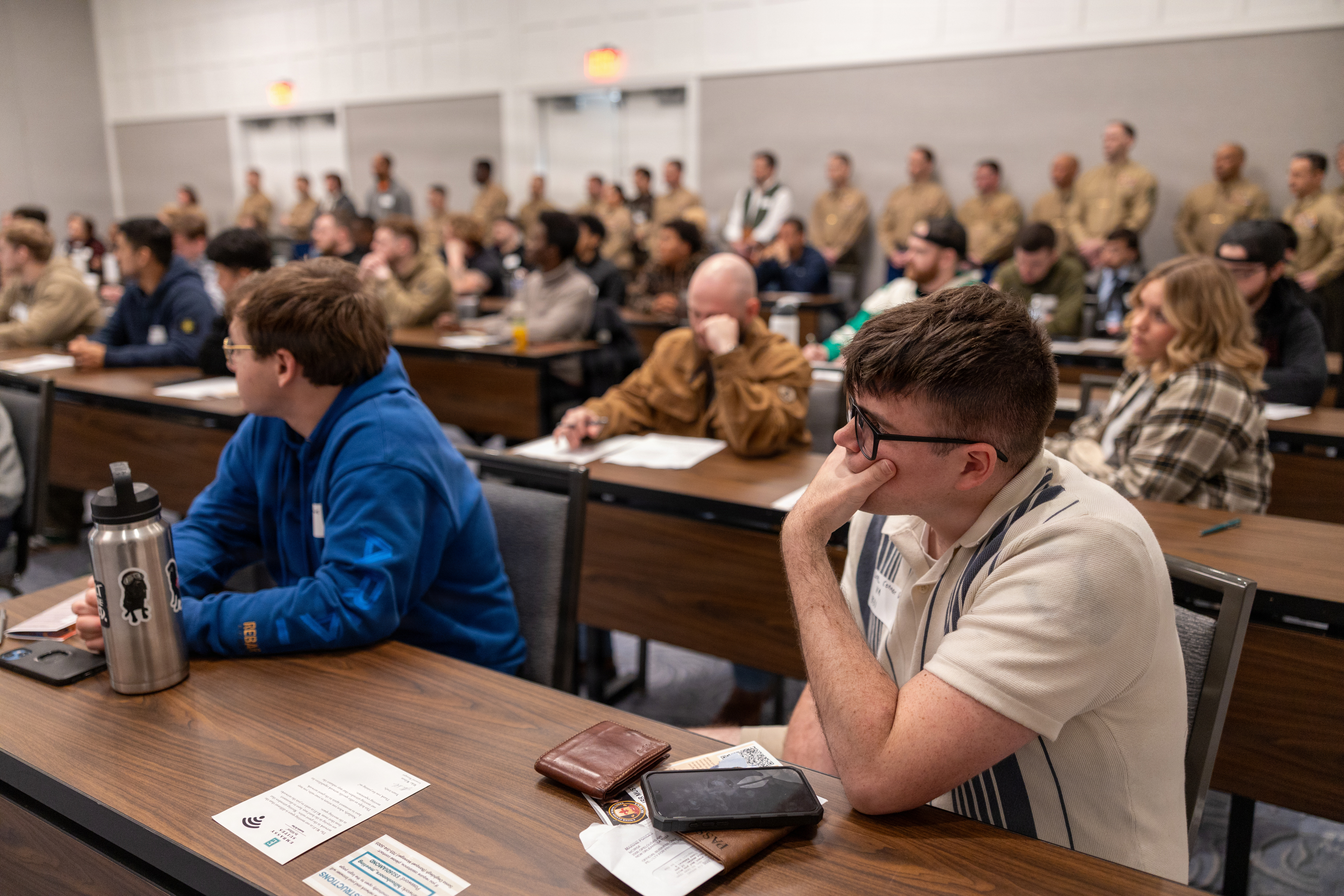 U.S. Marines with the Individual Ready Reserve listen to Honorable Hung Cao, the undersecretary of the Navy, during the Individual Ready Reserve muster at Arlington, Virginia, March 7, 2026. Marine Corps Individual Reserve Support Activity conducts administrative screenings of IRR Marines to ensure readiness to augment and reinforce the active component. (U.S. Marine Corps photo by Sgt. Emely Gonzalez)