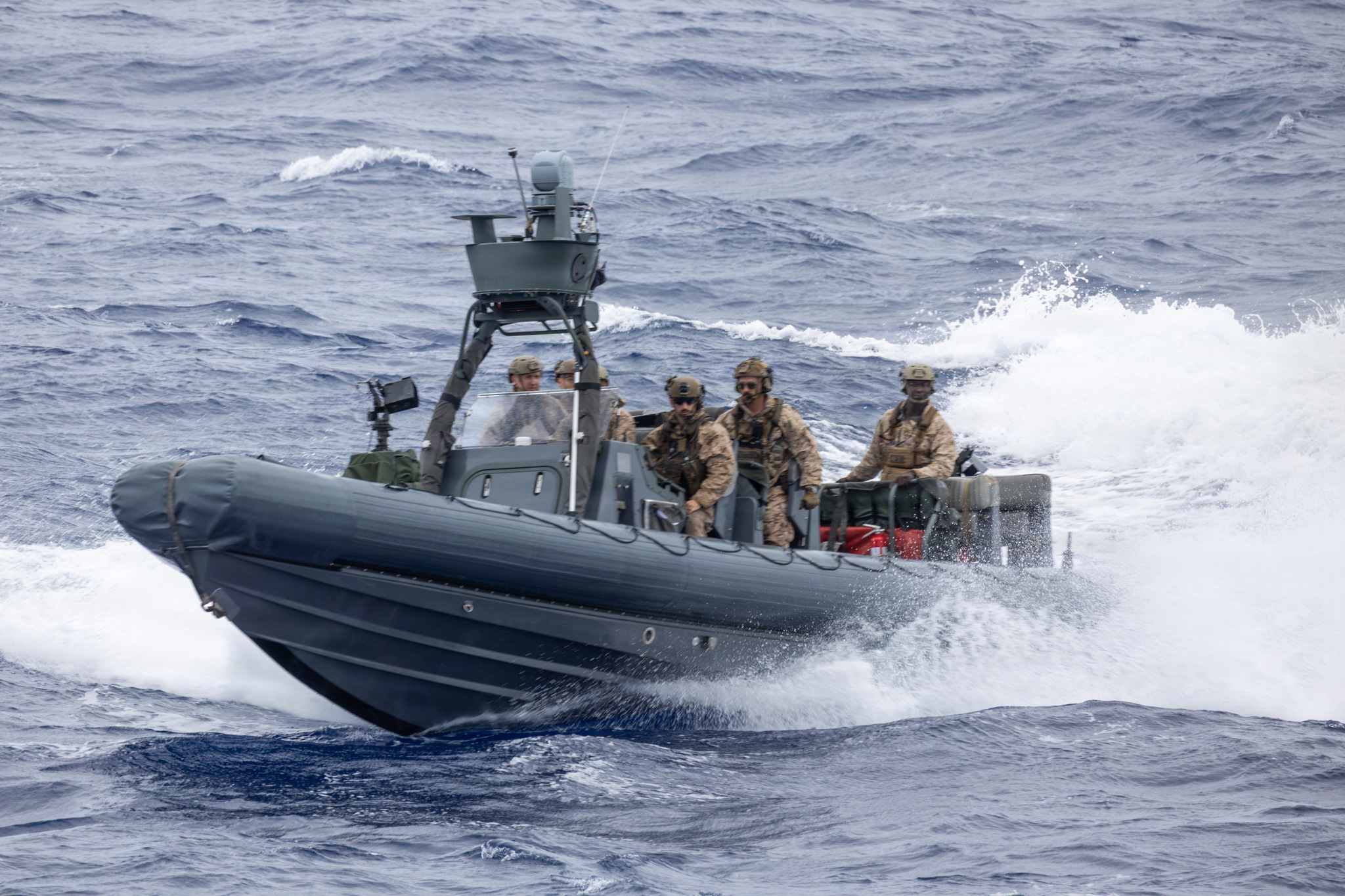 U.S. Marines with the Maritime Raid Force, 11th Marine Expeditionary Unit, operate a rigid-hulled inflatable boat in the Pacific Ocean, April 2, 2026. The 11th MEU is currently underway aboard the Boxer Amphibious Ready Group in the U.S. 3rd Fleet area of operations demonstrating the United States’ long-term commitment to a free and open Indo-Pacific. (U.S. Marine Corps photo by Cpl. Avery Wayland)