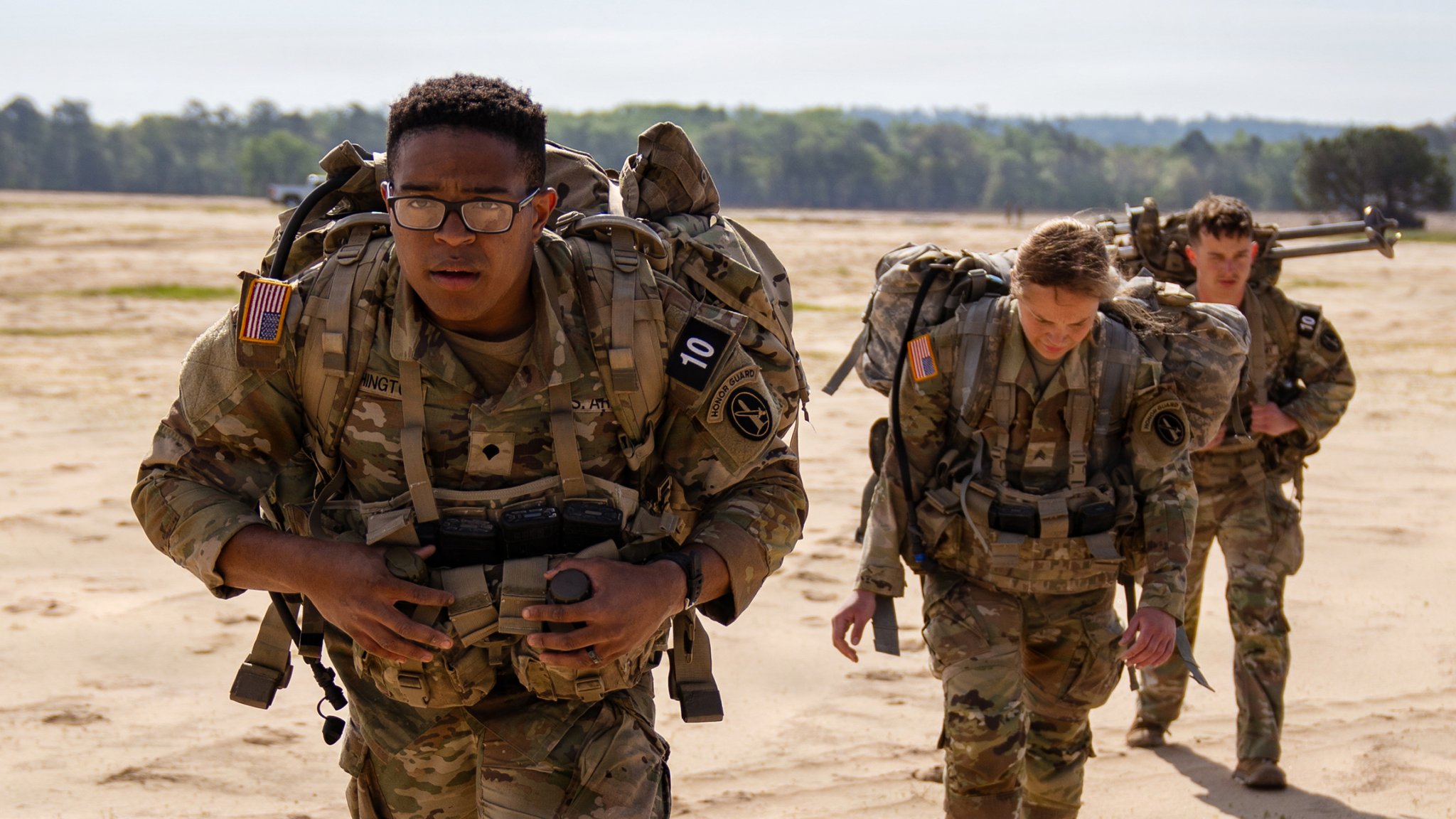 U.S. Army Soldiers assigned to the Presidential Salute Battery, 3d U.S. Infantry Regiment (The Old Guard), participate in a ruck march followed by a door bundle airdrop retrieval during the 2026 Best Mortar Competition at Fort Benning, GA. April 9, 2026. The event tests Soldiers’ endurance and ability to locate and recover equipment delivered by aerial resupply. (U.S. Army photo by Sgt. Christopher Smith)