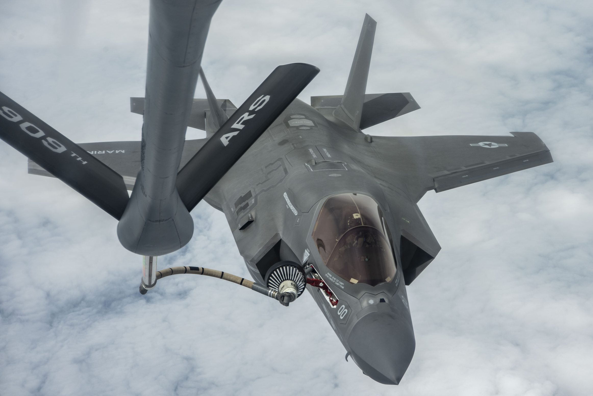 A U.S. Marine Corps F-35B Lightning II aircraft receives fuel from a U.S. Air Force KC-135 Stratotanker during Freedom Flag 25-1 off the east coast of the Republic of Korea, April 23, 2025. FF25-1 brought together U.S. and ROK units from across the Pacific theater, with aerial refueling playing a critical role in enabling effective operations across the vast region. The F-35 is assigned to Marine Fighter Attack Squadron 214, Marine Corps Air station Iwakuni, Japan, and the KC-135 is assigned to the 909th Air Refueling Squadron.(U.S. Air Force photo by Staff Sgt. Jason W. Cochran)