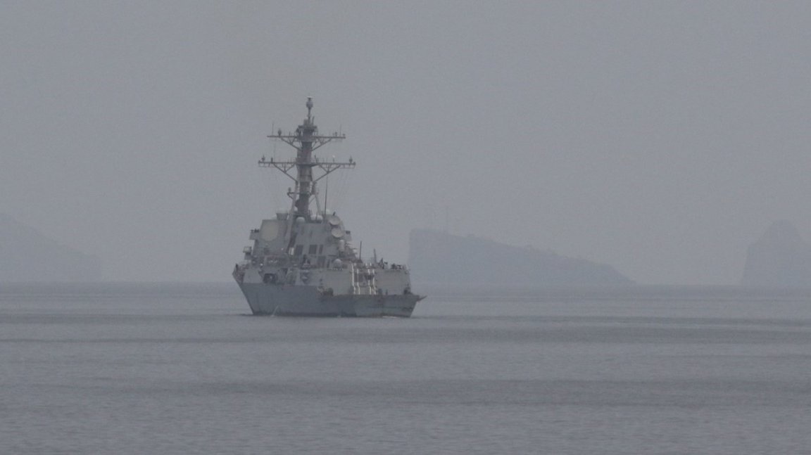 An American Navy destroyer sails through the Strait of Hormuz on April 11, 2026.