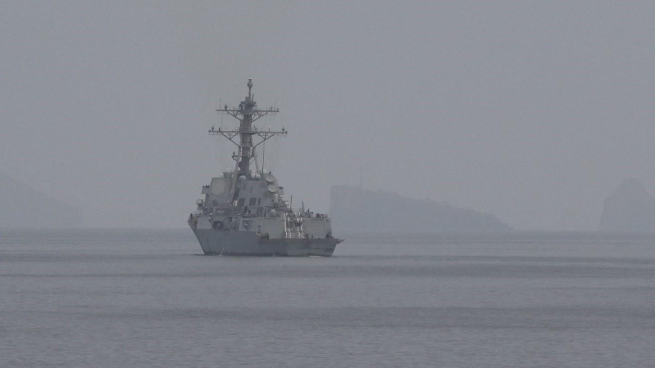 An American Navy destroyer sails through the Strait of Hormuz on April 11, 2026.