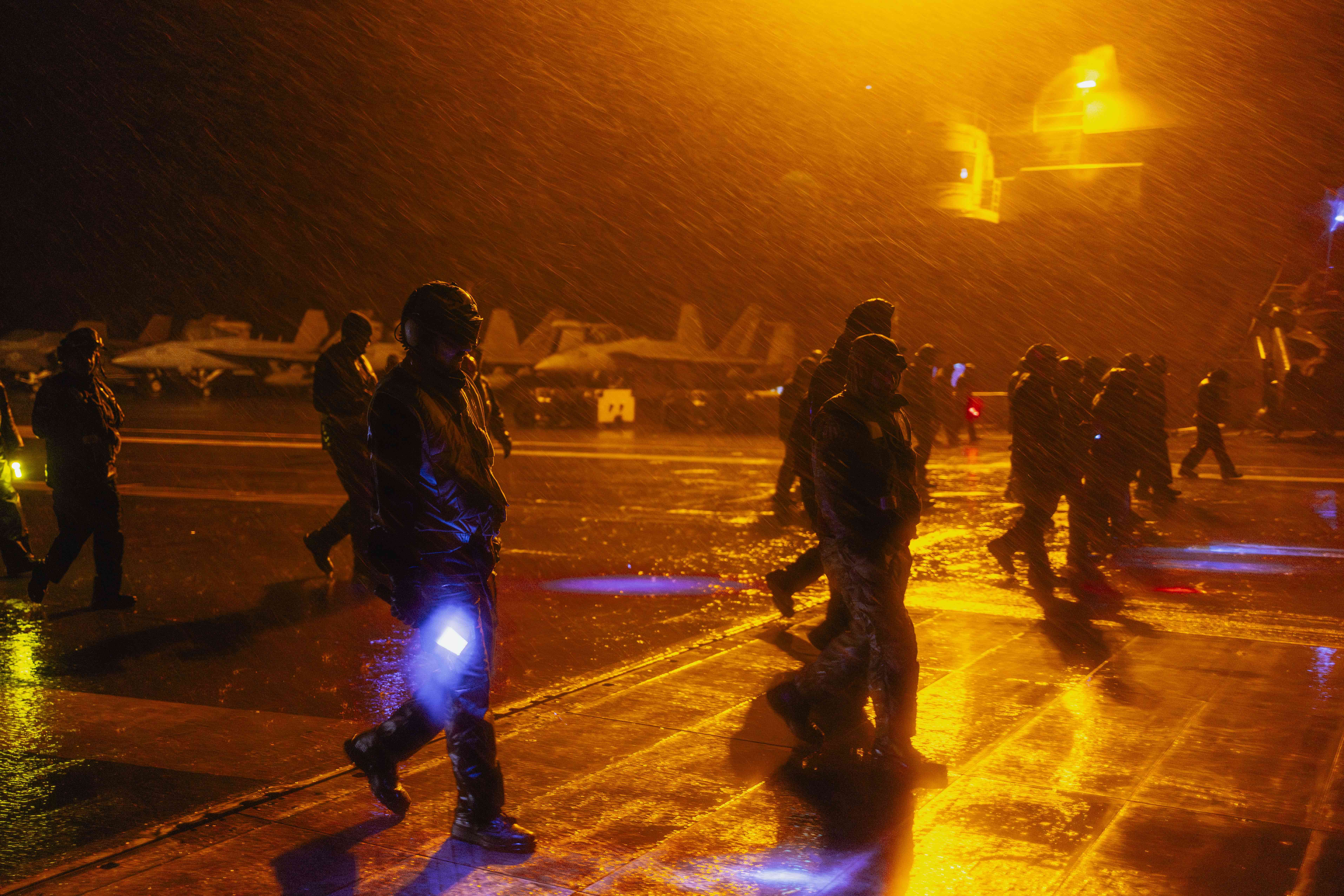 Sailors conducts foreign object debris walkdown on the flight deck of Nimitz-class aircraft carrier USS George Washington (CVN 73) in the Pacific Ocean, June 7, 2024. George Washington is deployed as part of Southern Seas 2024 which seeks to enhance capability, improve interoperability, and strengthen maritime partnerships with countries throughout the U.S. Southern Command area of responsibility through joint, multinational, and interagency exchanges and cooperation. (U.S. Navy photo by Mass Communication Specialist 3rd Class August Clawson)