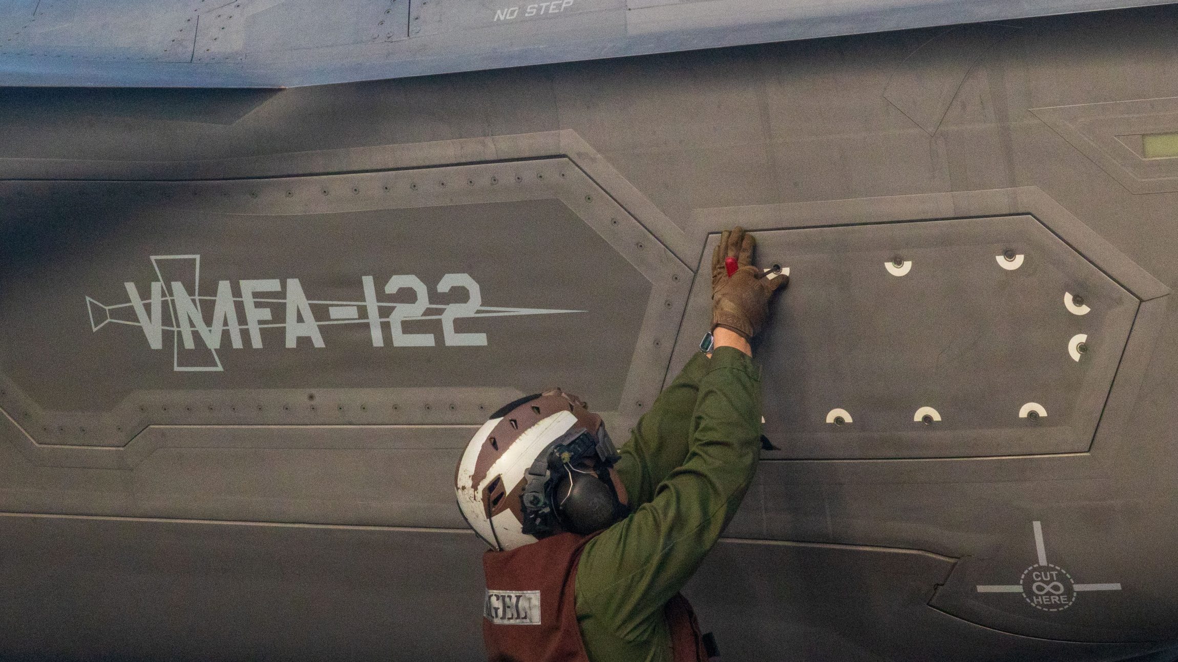 U.S. Marine Corps Lance Cpl. Johan Rangel, a power line mechanic with Marine Fighter Attack Squadron (VMFA) 122, 11th Marine Expeditionary Unit, conducts maintenance on an F-35B aboard Wasp-class amphibious assault ship USS Boxer (LHD 4), in the Pacific Ocean, Jan. 24, 2026. The 11th MEU is currently underway aboard the Boxer Amphibious Ready Group in the U.S. 3rd Fleet area of operations conducting integrated training that enhances lethality and warfighting readiness. (U.S. Marine Corps photo by Lance Cpl. Nicole Stuart)