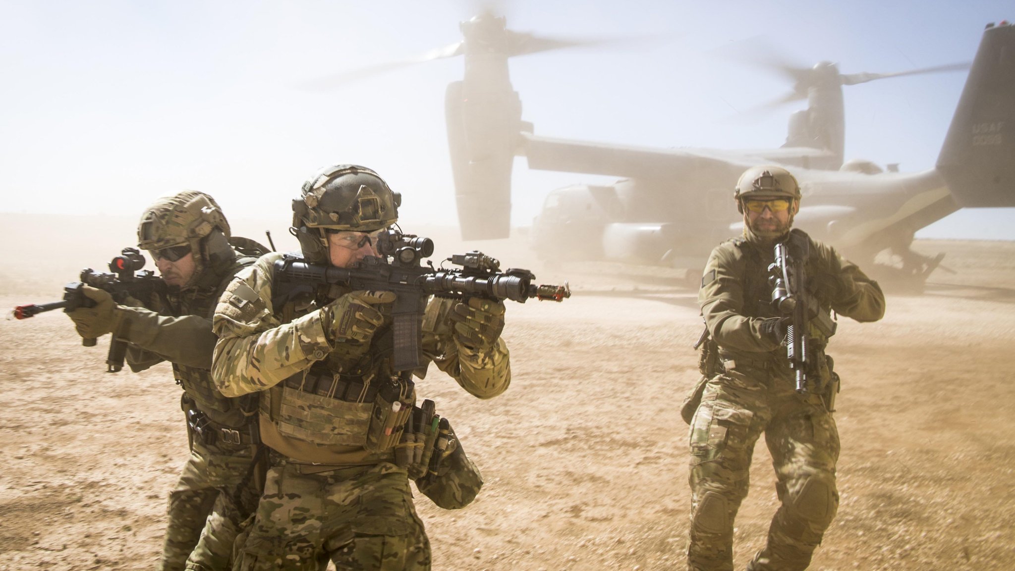 A joint special forces team move together out of a U.S. Air Force CV-22 Osprey Feb. 26, 2018, at Melrose Training Range, New Mexico. At Emerald Warrior, the largest joint and combined special operations exercise, U.S. Special Operations Command forces train to respond to various threats across the spectrum of conflict. (U.S. Air Force photo/Senior Airman Clayton Cupit)