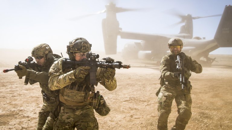 A joint special forces team move together out of a U.S. Air Force CV-22 Osprey Feb. 26, 2018, at Melrose Training Range, New Mexico. At Emerald Warrior, the largest joint and combined special operations exercise, U.S. Special Operations Command forces train to respond to various threats across the spectrum of conflict. (U.S. Air Force photo/Senior Airman Clayton Cupit)