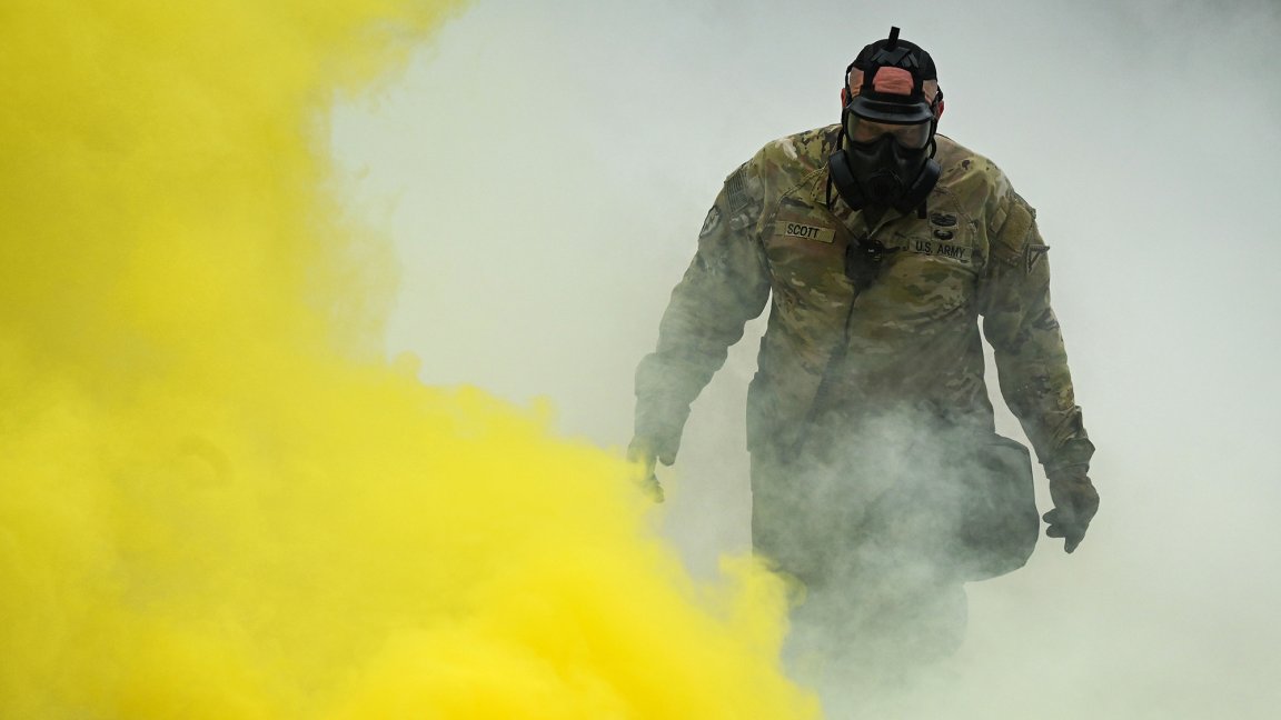 U.S. Army Sgt. 1st Class Richard Scott, assigned to 7th Army Training Command, observes candidates moving through a trench during the U.S. Army Europe and Africa European Best Sniper Team Competition in the 7th Army Training Command's Grafenwoehr Training Area, Grafenwoehr, Germany, Nov. 20, 2025. The USAREUR-AF EBST Competition held annually at 7th Army Training Command’s Grafenwoehr Training Area builds military readiness through realistic and challenging training scenarios, fosters military partnership and esprit des corps, and promotes NATO interoperability with Allied and Partner nations. (U.S. Army photo by Markus Rauchenberger)