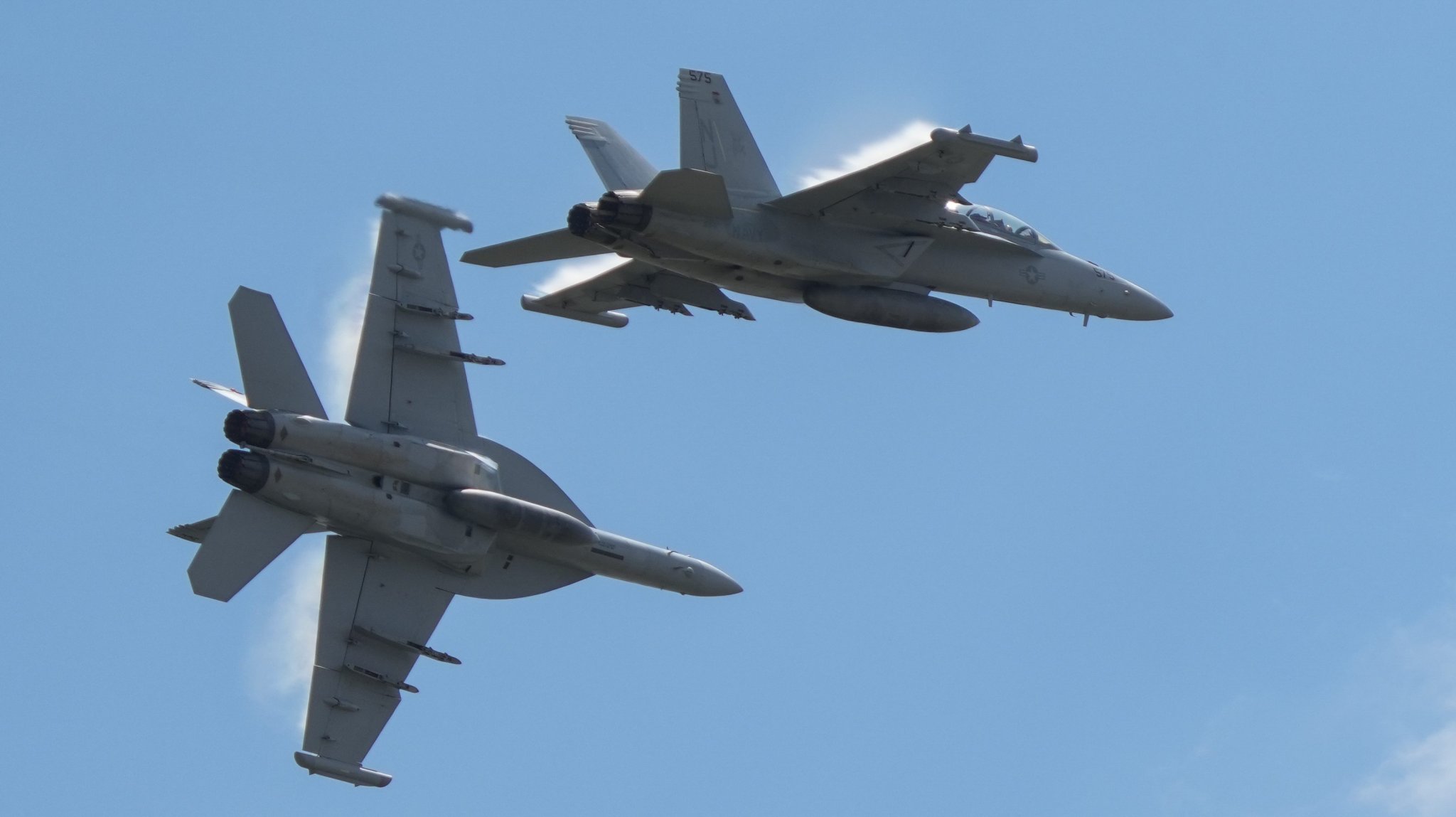 Two U.S. Navy EA-18G Growlers assigned to the Growler Demo Team perform a capabilities demonstration during the Guardians of Freedom Airshow, Aug. 27, 2023, at the Lincoln Airport, Nebraska. Hosted by the Nebraska National Guard, Offutt Air Force Base, Lincoln Airport and the Lincoln Chamber of Commerce, the event provides the community with an opportunity to view the robust capabilities of U.S. military air power. The Growler Demo Team performs at air shows across the United States as part of the U.S. Navy Legacy Flight Team, designed to keep Naval Aviation’s ties to its proud heritage alive and viable. (U.S. Air National Guard photo by Airman 1st Class Jeremiah Johnson)