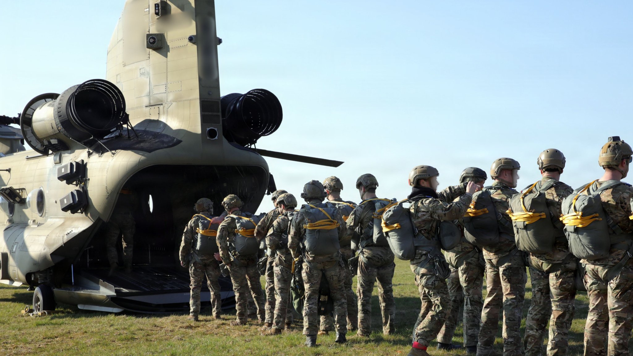 Image: Soldiers with U.S. Special Operations Command Europe prepare to board a CH-47 Chinook helicopter for a low-level static line parachute jump at Malmsheim Drop Zone in Renningen, Germany, March 18, 2026. Personnel with SOCEUR conducted these airborne training jumps to stay current on their parachute certifications, ensuring they remain ready for real-world missions. (U.S. Army National Guard photo by Sgt. Glenn Brennan)