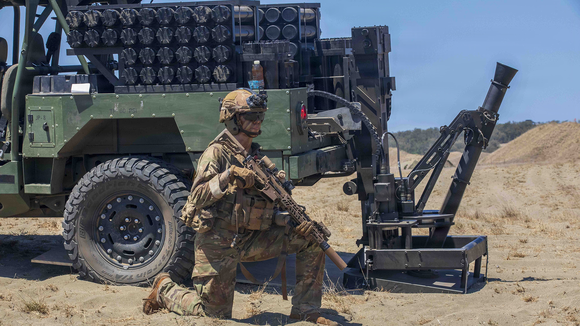 U.S. Army Spc. Riley Bowling, a mortarman assigned to 2nd Battalion, 35th Infantry Regiment, 3rd Mobile Brigade, 25th Infantry Division, conducts security measures around her Scorpion Light Mobile Mortar System during a counter landing life-fire exercise as part of Exercise Balikatan 2026 in Laoag City, Philippines, May 3, 2026. Balikatan is a longstanding annual exercise between the Armed Forces of the Philippines and U.S. military that represents the strength of our alliance, improves our capable combined force, and demonstrates our commitment to regional peace and prosperity. (U.S. Army photo by Spc. Hunter Carpenter)