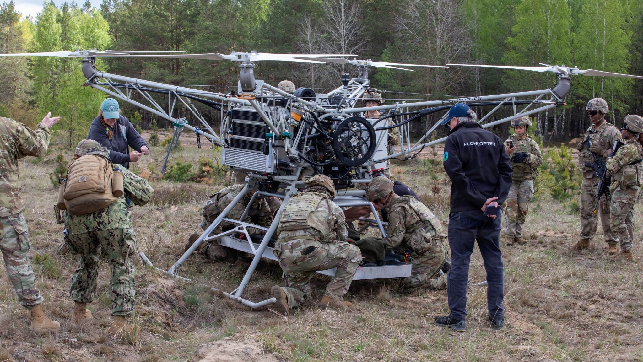 U.S. Army Soldiers assigned to the Regimental Support Squadron, 2d Cavalry Regiment, strap down a test dummy to a drone during an Autonomous Triage and Treatment Challenge taking place near Bemowo Piskie Training Area, Poland, May 10, 2026. From April 27 to May 31, 2026, U.S. and Allied forces will exercise the North Atlantic Treaty Organization’s (NATO) Eastern Flank Deterrence Initiative, demonstrating NATO’s ability to fight and win on the modern battlefield. Nearly 15,000 troops from eleven nations will train across the High North, Baltic region, and Poland. They will execute rapid maneuvers, air defense, counter-drone operations, and cyber defense to validate NATO’s regional defense plans in real time. This series of linked exercises includes Saber Strike, Immediate Response, and Swift Response. The exercises turn investment into capability. Soldiers integrate unmanned systems such as AI-enabled command and control and live data networks to move, decide, and fight more effectively across all domains. Sword 26 demonstrates how U.S. Army Europe and Africa drives transformation at scale while strengthening deterrence. Together with our allies, we are building a unified, lethal force ready to defend NATO territory and respond to any threat. (U.S. Army Reserve photo by Spc. Thomas Madrzak)