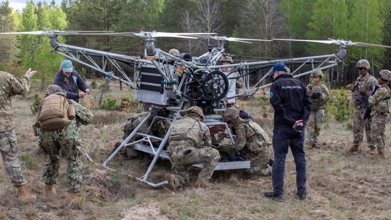 U.S. Army Soldiers assigned to the Regimental Support Squadron, 2d Cavalry Regiment, strap down a test dummy to a drone during an Autonomous Triage and Treatment Challenge taking place near Bemowo Piskie Training Area, Poland, May 10, 2026. From April 27 to May 31, 2026, U.S. and Allied forces will exercise the North Atlantic Treaty Organization’s (NATO) Eastern Flank Deterrence Initiative, demonstrating NATO’s ability to fight and win on the modern battlefield. Nearly 15,000 troops from eleven nations will train across the High North, Baltic region, and Poland. They will execute rapid maneuvers, air defense, counter-drone operations, and cyber defense to validate NATO’s regional defense plans in real time. This series of linked exercises includes Saber Strike, Immediate Response, and Swift Response. The exercises turn investment into capability. Soldiers integrate unmanned systems such as AI-enabled command and control and live data networks to move, decide, and fight more effectively across all domains. Sword 26 demonstrates how U.S. Army Europe and Africa drives transformation at scale while strengthening deterrence. Together with our allies, we are building a unified, lethal force ready to defend NATO territory and respond to any threat. (U.S. Army Reserve photo by Spc. Thomas Madrzak)