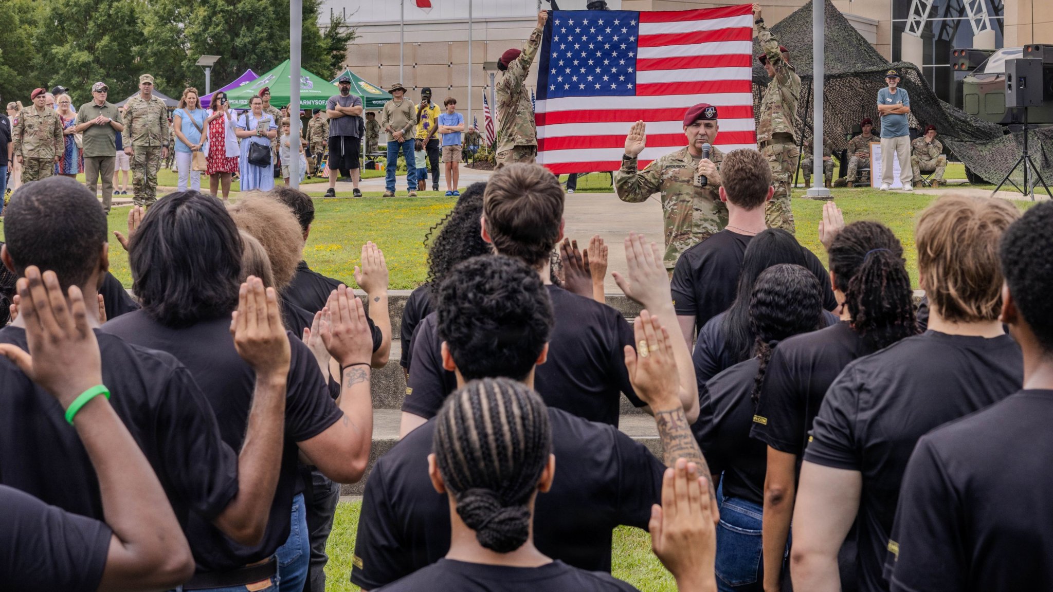 U.S. Army Lt. Gen. Gregory K. Anderson, commanding general of the XVIII Airborne Corps, conducts the oath of enlistment for 64 future U.S. Soldiers during the 85th National Airborne Day celebration at the Airborne and Special Operations Museum, Fayetteville, N.C., Aug. 16, 2025. This event commemorated paratroopers past and present, celebrating 85 years of U.S. airborne history with events at the Airborne and Special Operations Museum (ASOM).