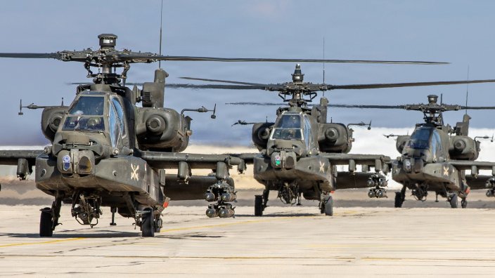 Army AH-64 Apache attack helicopters sunk several Iranian boats, U.S. officials said, as the first day of the operation to escort commercial ships through the Straits of Hormuz resulted in combat.