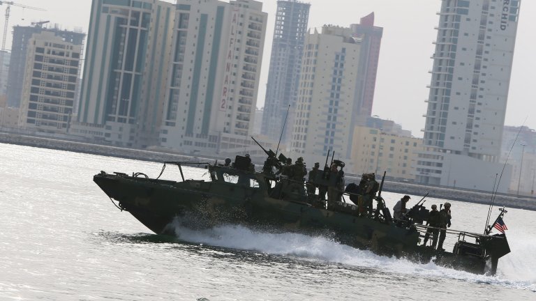 A US Navy Riverine Command Boat (RCB) cruises off the coast of Bahrain's Salman port, near the capital Manama, on May 12, 2013, one day before the start of the biggest exercise of mine countermeasure maneuvers in the Arabian Gulf. The US Navy along with other 40 nations are conducting the games. AFP PHOTO/MARWAN NAAMANI (Photo by MARWAN NAAMANI / AFP) (Photo by MARWAN NAAMANI/AFP via Getty Images)