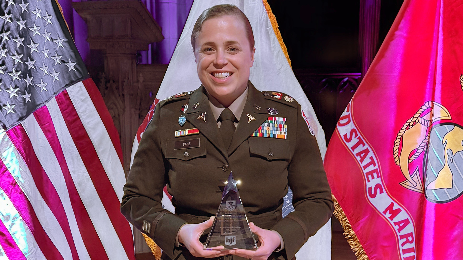 Dr. Erika Page, a major in the Arizona National Guard, receives the Hero of Military Medicine Award for her leadership of a medical team that treated 70 soldiers and airmen after the Tower 22 drone attack in Jordan.