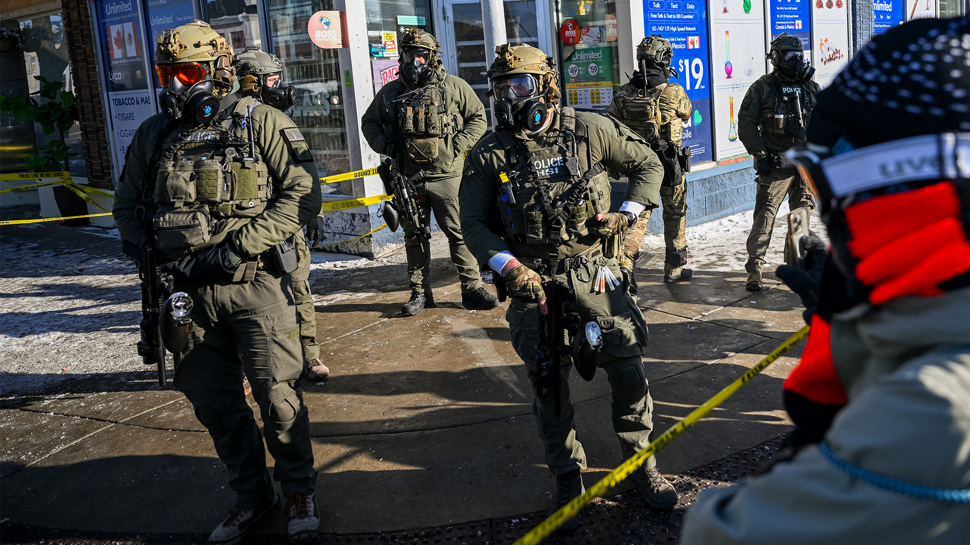 A crowd gathers after federal agents shot a protestor in a scuffle, January 24, 2026, in Minneapolis, Minnesota, where the Trump administration had sent thousands of federal agents to arrest undocumented immigrants.