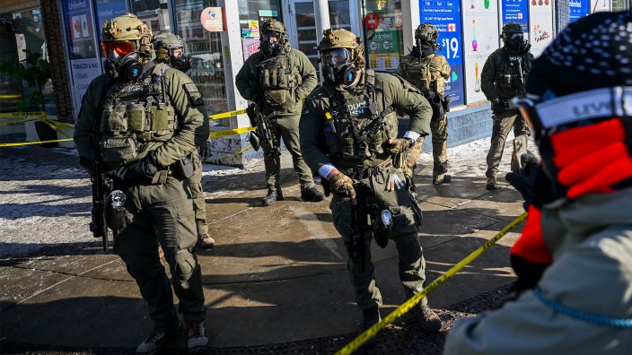 A crowd gathers after federal agents shot a protestor in a scuffle, January 24, 2026, in Minneapolis, Minnesota, where the Trump administration had sent thousands of federal agents to arrest undocumented immigrants.