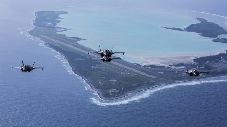 F-35B Lightning IIs, with Marine Fighter Attack Squadron 211, the Wake Island Avengers and 13th Marine Expeditionary Unit, fly over Wake Island during a regularly scheduled deployment of the Essex Amphibious Ready Group and the 13th MEU, Aug. 1, 2018. Air Force Civil Engineer Center is partnering with the 611th Civil Engineer Squadron at Joint Base Elmendorf-Richardson, Alaska, to modernize infrastructure at Wake Island. The airfield will receive new lighting, and grounding and pavement markings to support mission readiness and global air mobility. (U.S. Marine Corps photo by Cpl. Francisco J. Diaz Jr.) 