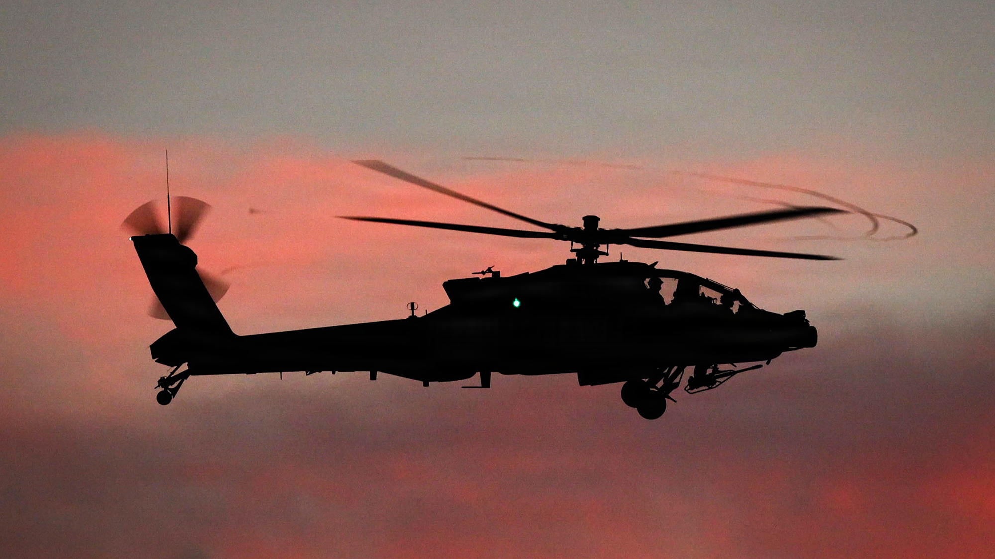 An AH-64 Apache Helicopter flight crew assigned to 2nd Squadron, 6th Cavalry Regiment "Sabers", 25th Combat Aviation Brigade, execute an aerial gunnery designed to certify pilots on their weapons systems at Pohakuloa Training Area, Hawaii from February 2-25, 2026. Flight crews conduct gunnery tables which range from dry-fire, individual skills to live-fire, collective combat scenarios. An aerial gunnery is a semi annual requirement necessary to maintain proficiency of aircrews, and allows the unit to build a more reliable combat power. (U.S. Army Photo by Sgt. Olivia Cowart)