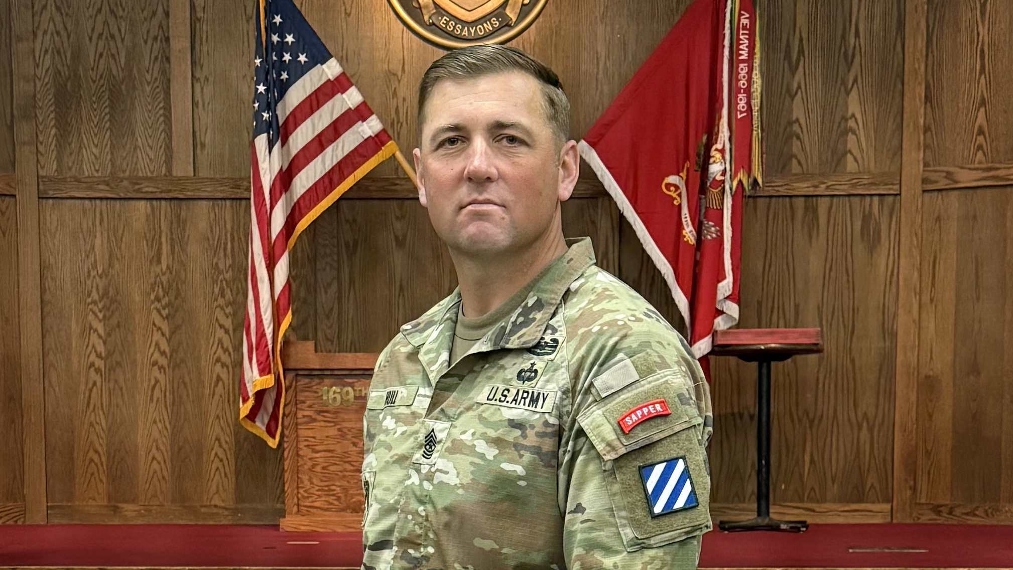 U.S. Army Sgt. Maj. Russel Hull, senior enlisted leader of 9th Brigade Engineer Battalion, 2nd Armored Brigade Combat Team, 3rd Infantry Division, stops for a photo at his graduation from the Army's Sapper Leader Course. Hull is the first sergeant major to graduate from the course since 2010. (U.S. Army photo by Fort Leonard Wood Public Affairs Office)