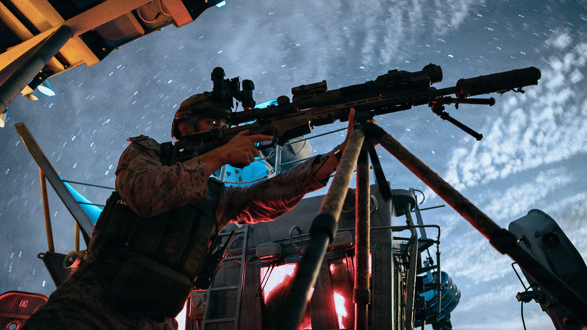 U.S. Marine Corps Sgt. Yoel Rhe, a scout team leader with Weapons Company, Battalion Landing Team 3/5, 11th Marine Expeditionary Unit, scans for vessels aboard Wasp-class amphibious assault ship USS Boxer (LHD 4) while transiting the Surigao Strait, April 26, 2026. The 11th MEU, embarked aboard the Boxer Amphibious Ready Group, is a persistent, combat credible force contributing to deterrence and crisis response in the U.S. 7th Fleet area of operations. U.S. 7th Fleet, the U.S. Navy's largest forward-deployed numbered fleet, routinely interacts and operates with allies and partners to preserve a free and open Indo-Pacific. (U.S. Marine Corps photo by Sgt. Joseph Helms)